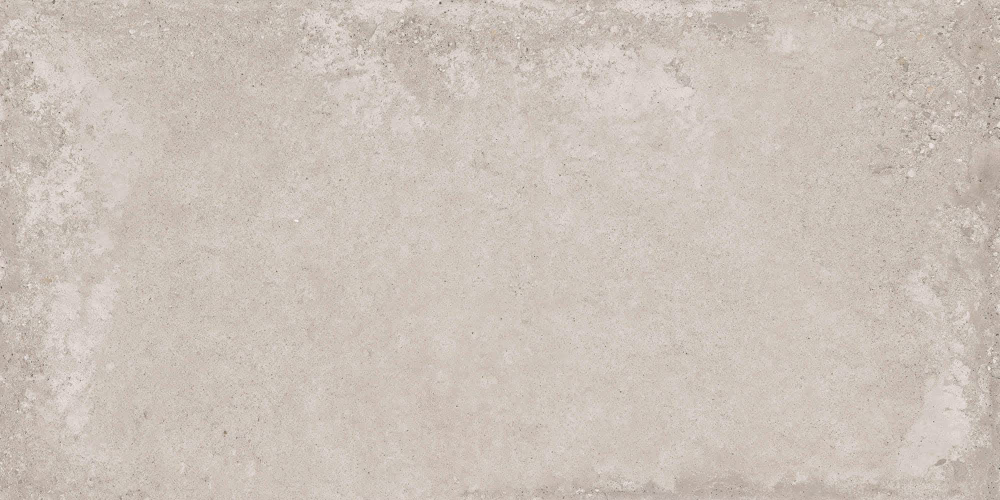 Light grey textured concrete surface with subtle patterns and slight roughness.