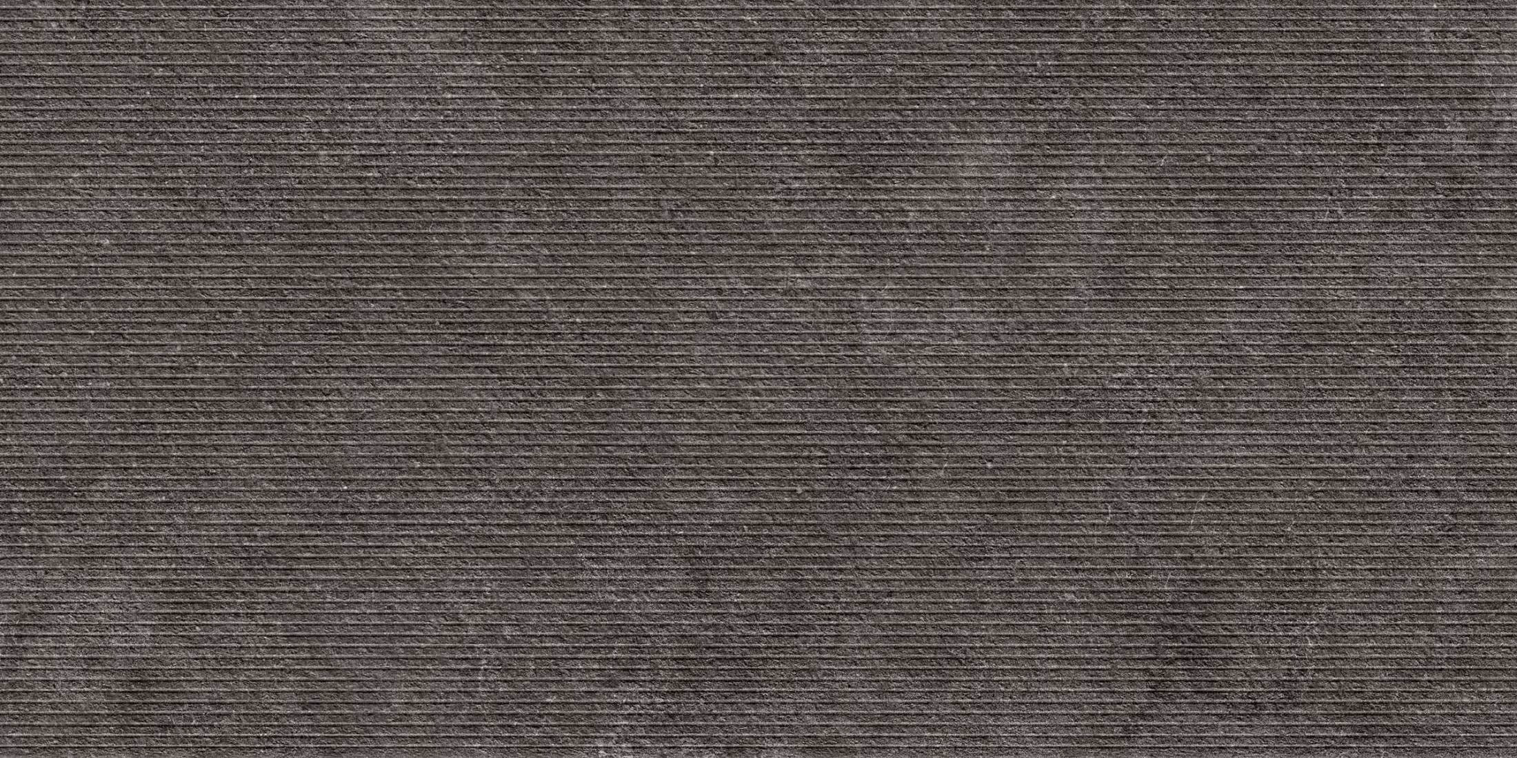 Dark textured surface with horizontal ridges across the entire image.