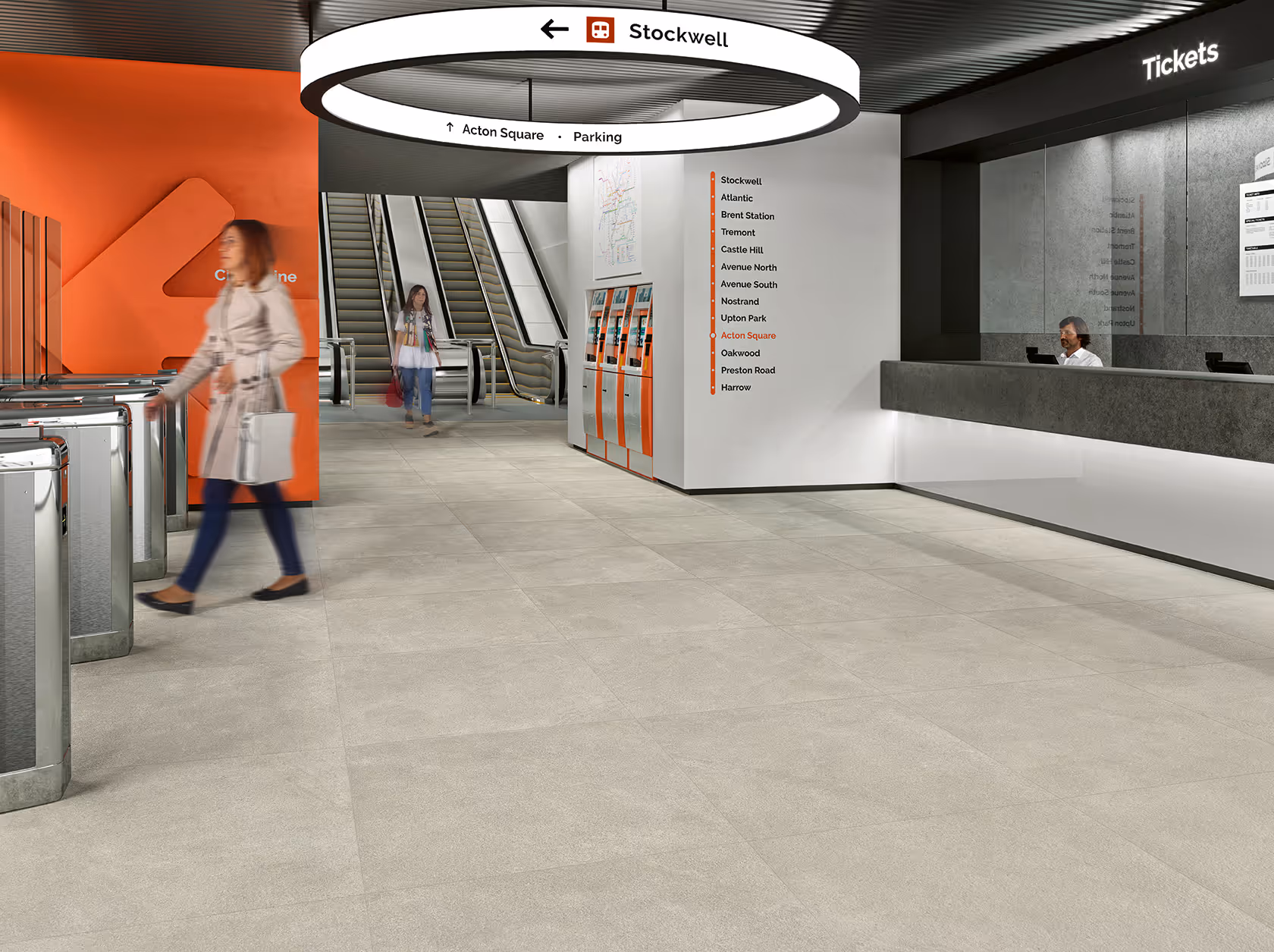 Modern subway station entrance with ticket gates, escalators, ticket counter, and directional signs.