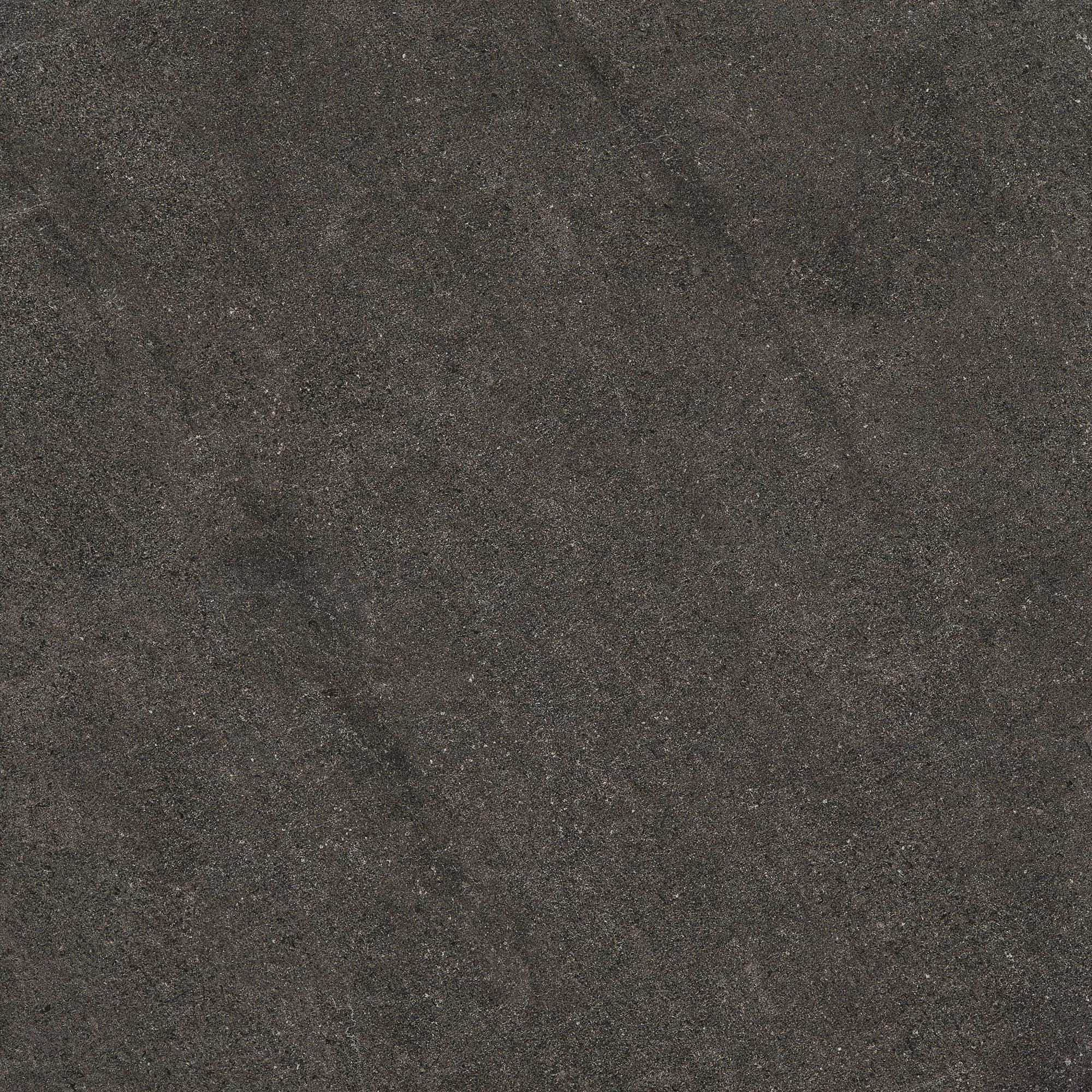 Dark gray textured stone surface with subtle natural patterns and grainy details.