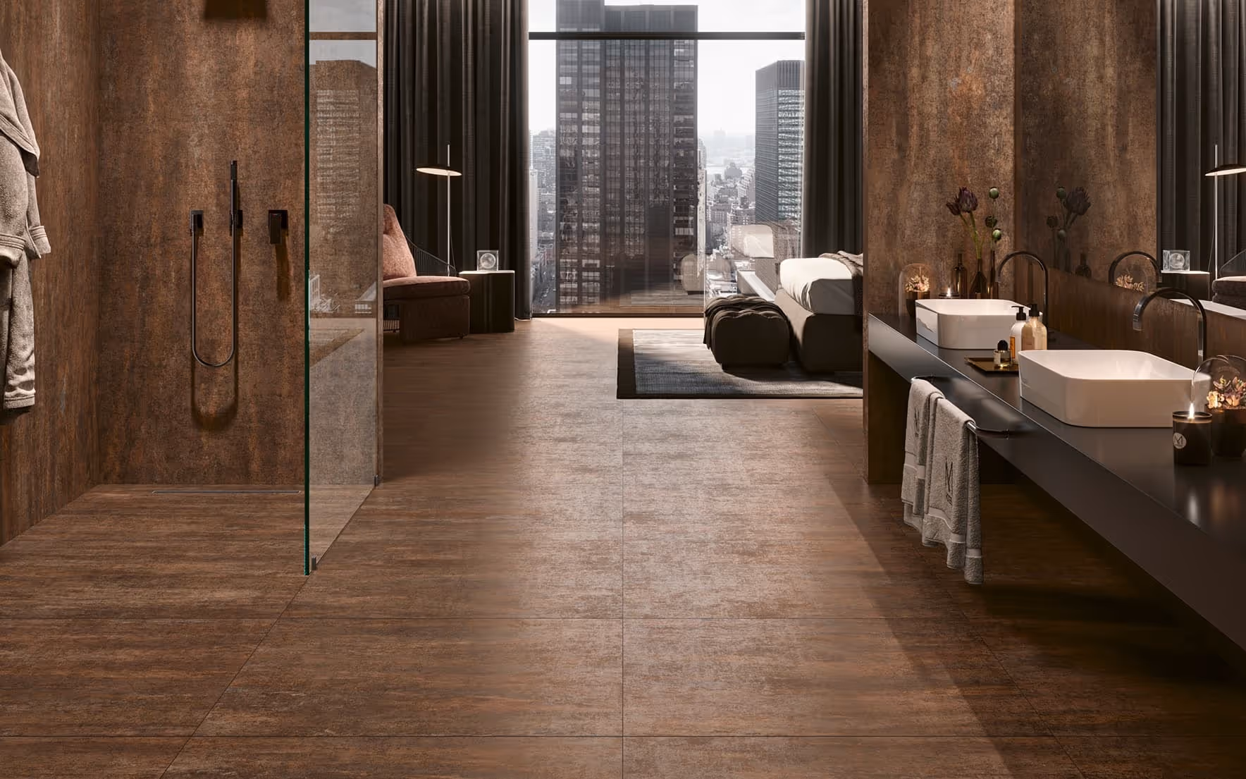 Modern bathroom with brown tiled floor, walk-in shower, double sinks, and cityscape view through floor-to-ceiling windows.