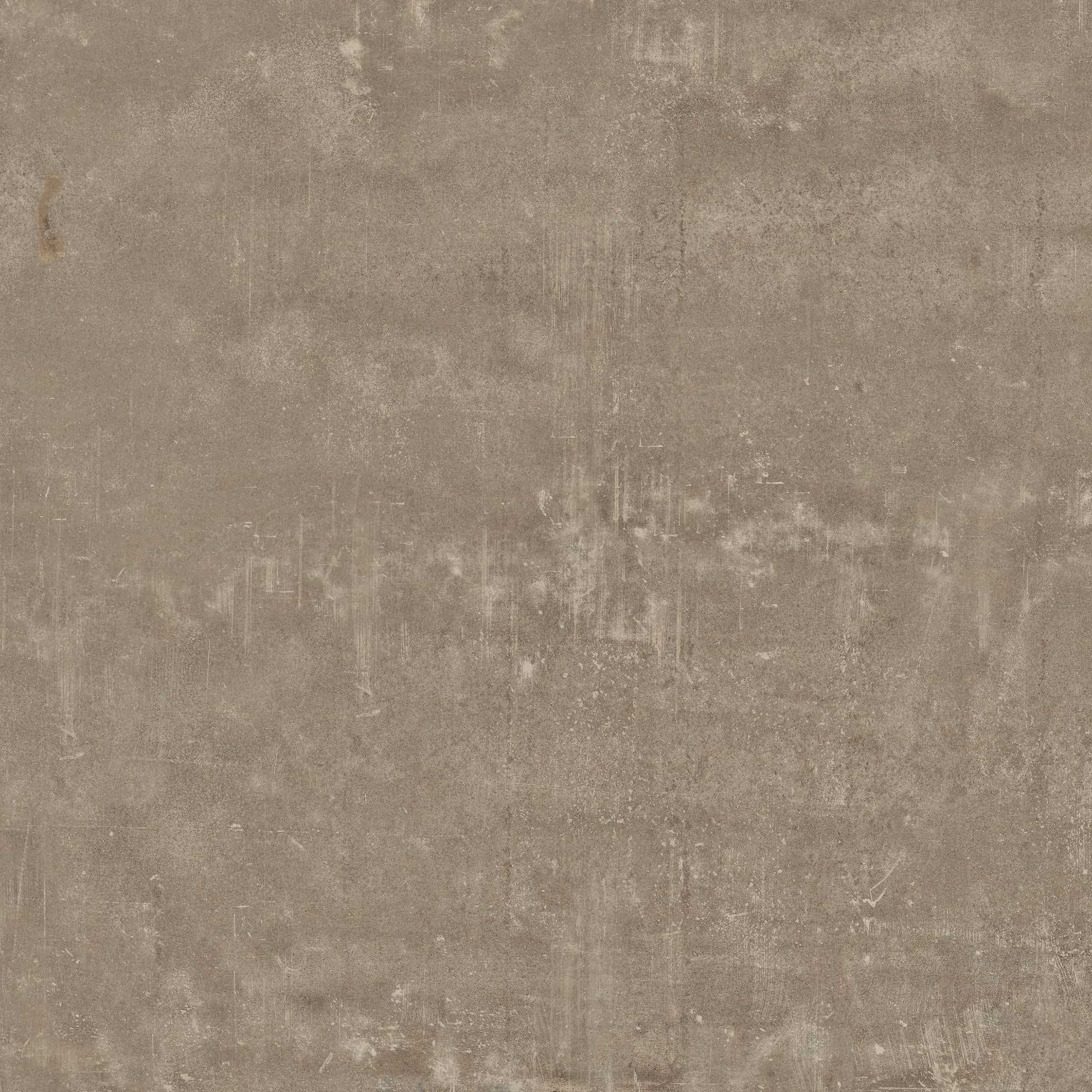 Textured surface resembling weathered clay or concrete in muted brown and gray tones.