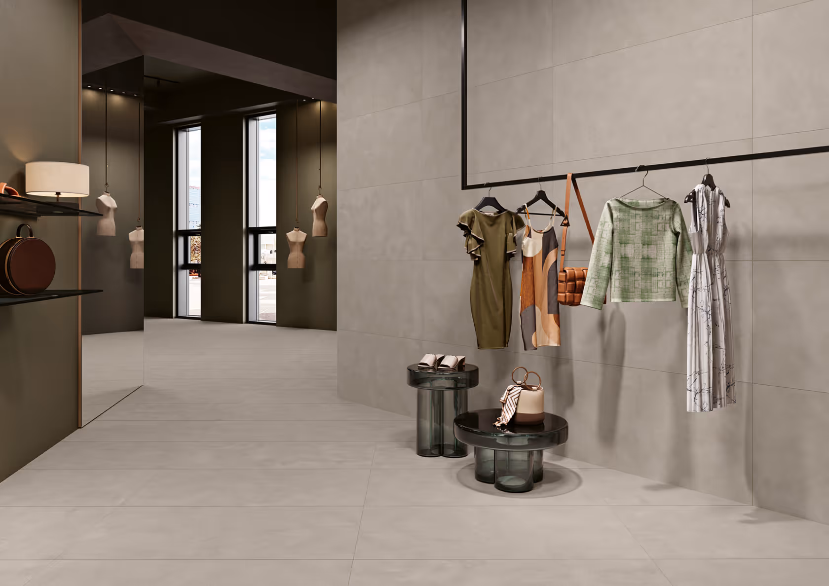 Modern boutique interior with dresses, handbags, and shoes displayed on a wall rack and tables.