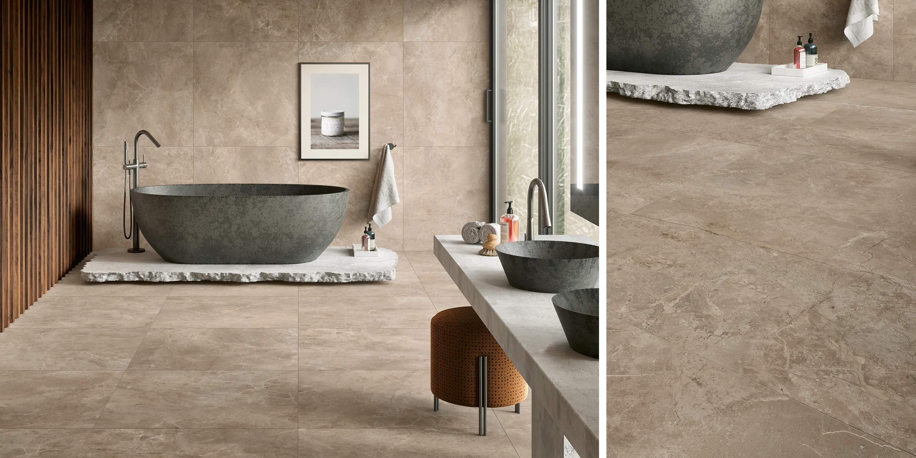 Modern bathroom with a stone bathtub on a rough slab, two stone sinks, and beige marble tiles.