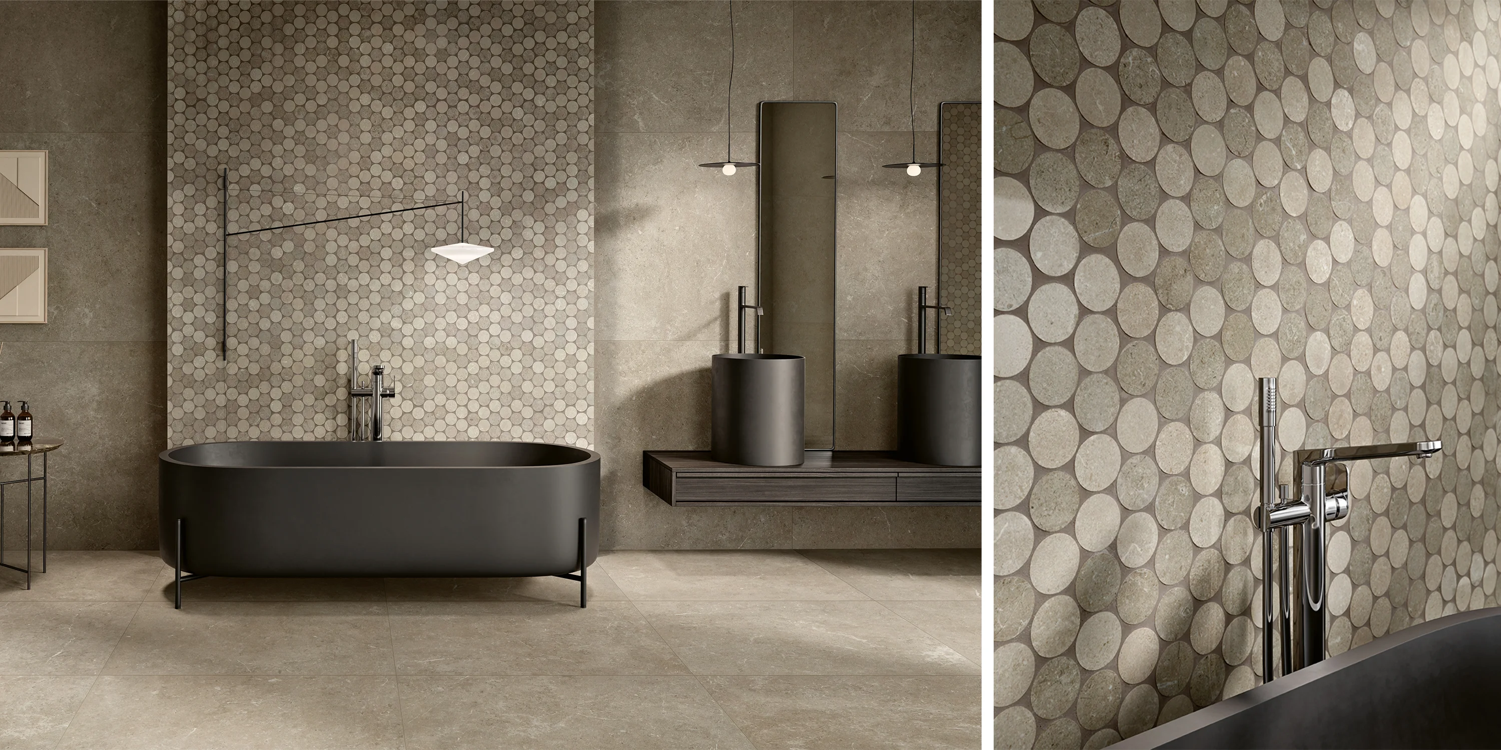 Modern bathroom with dark freestanding tub, circular mosaic tile wall, double sinks, and pendant lights.