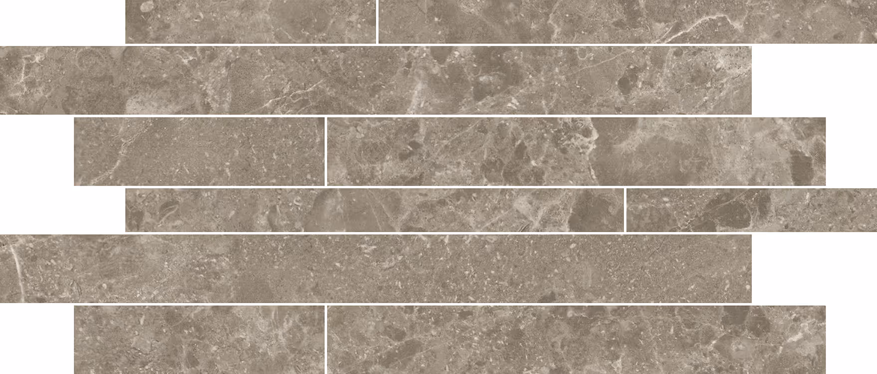 Rows of grey stone bricks with natural texture and veining patterns.
