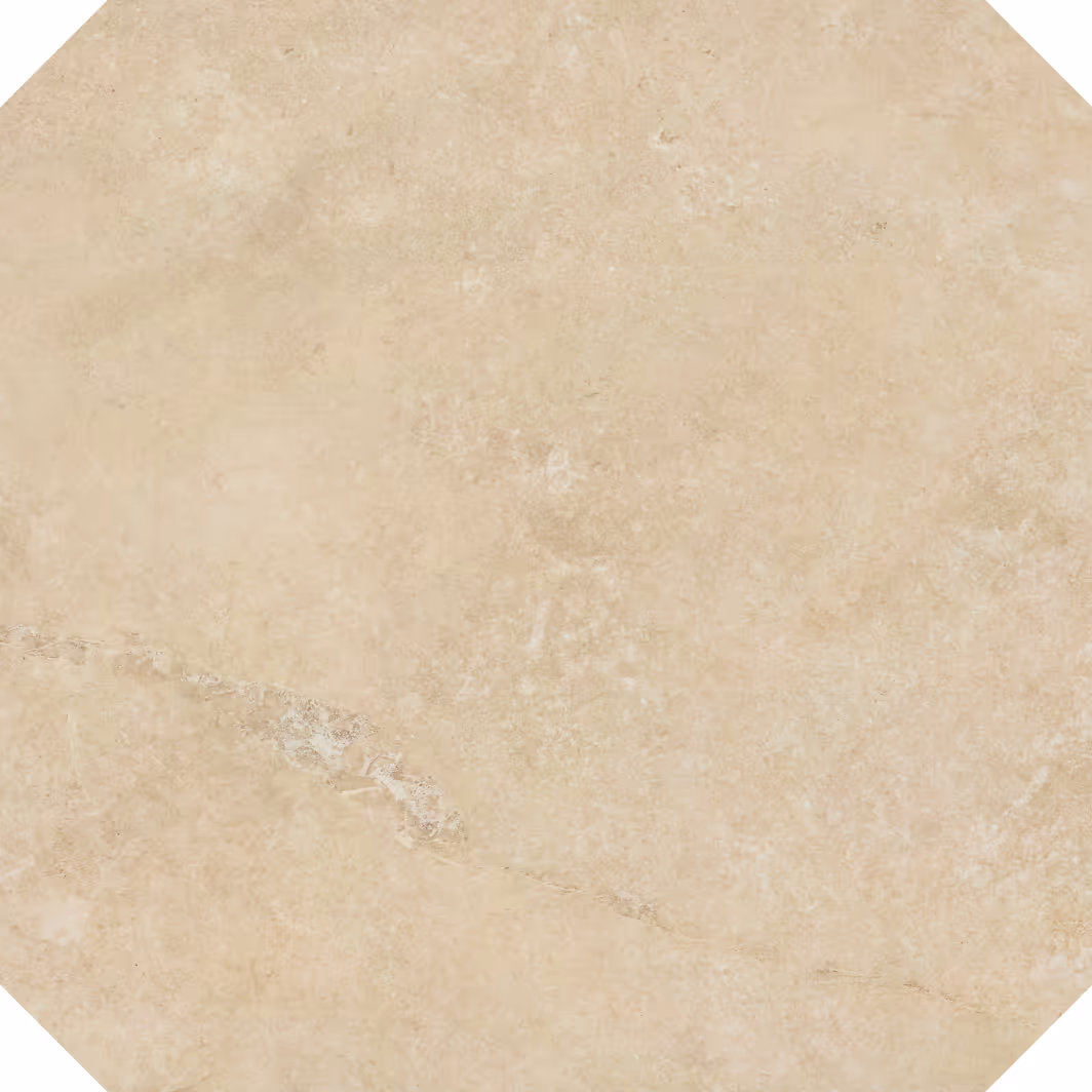Beige marble tile with subtle natural veining and texture in an octagonal shape.