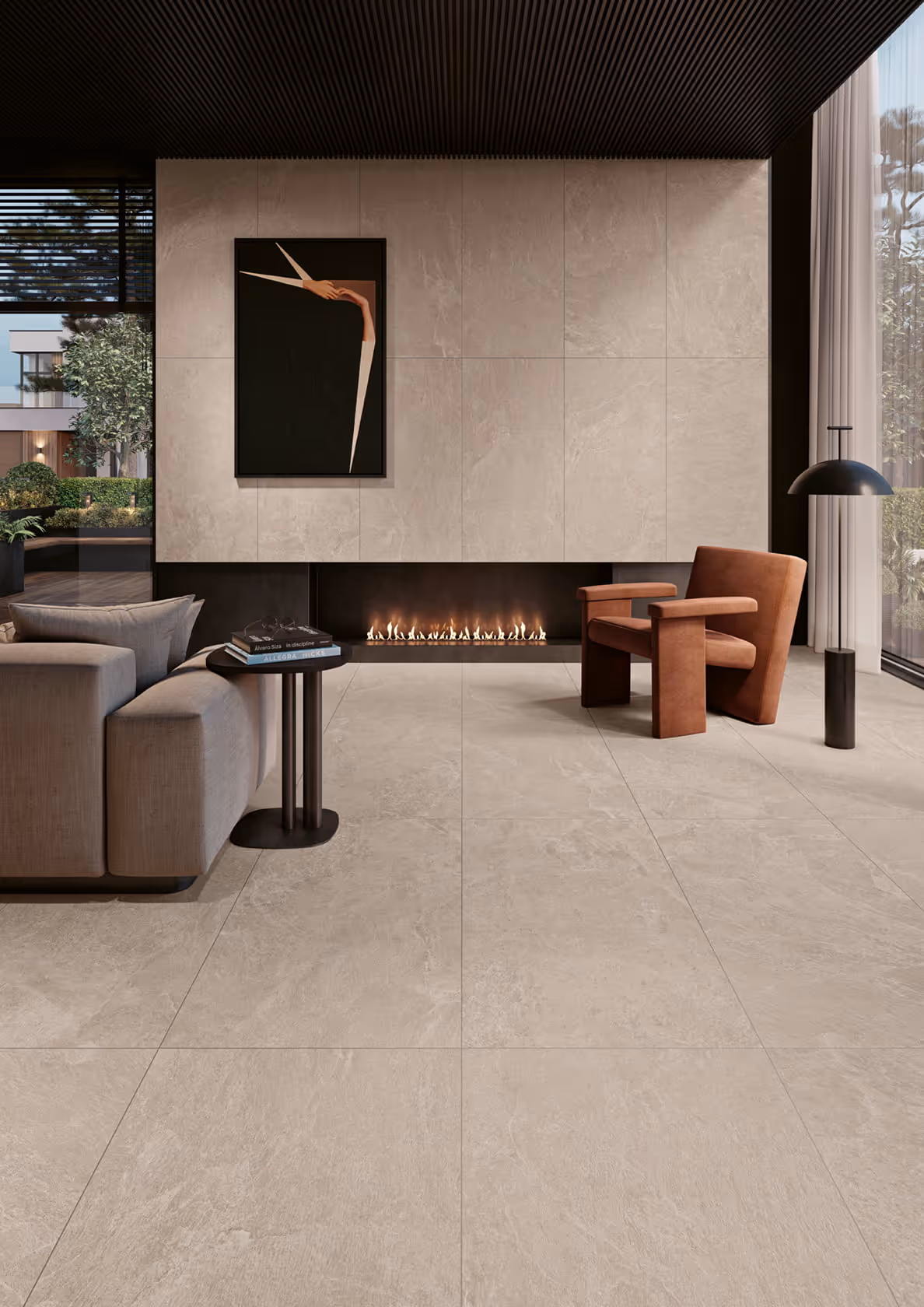 Modern living room with beige tiled floor, fireplace, brown armchair, gray sofa, and black floor lamp.