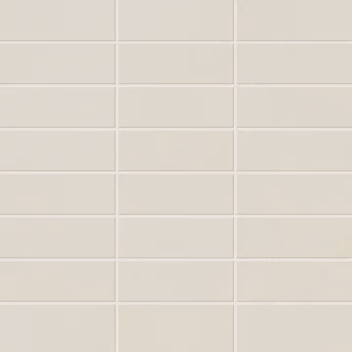 Grid of smooth, rectangular beige tiles with thin grout lines in a vertical layout.