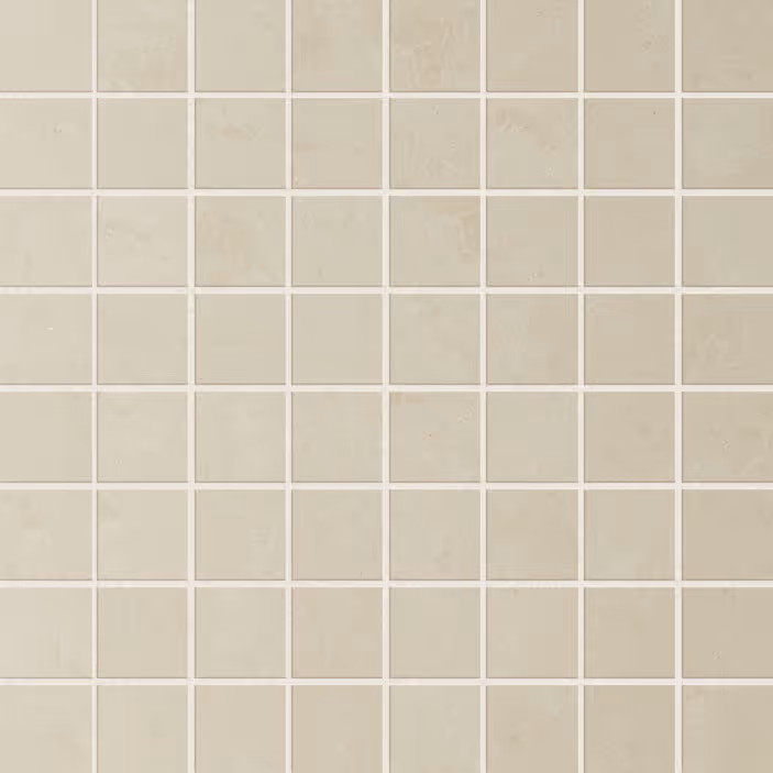 Grid of square beige tiles with light gray grout lines forming a mosaic pattern.