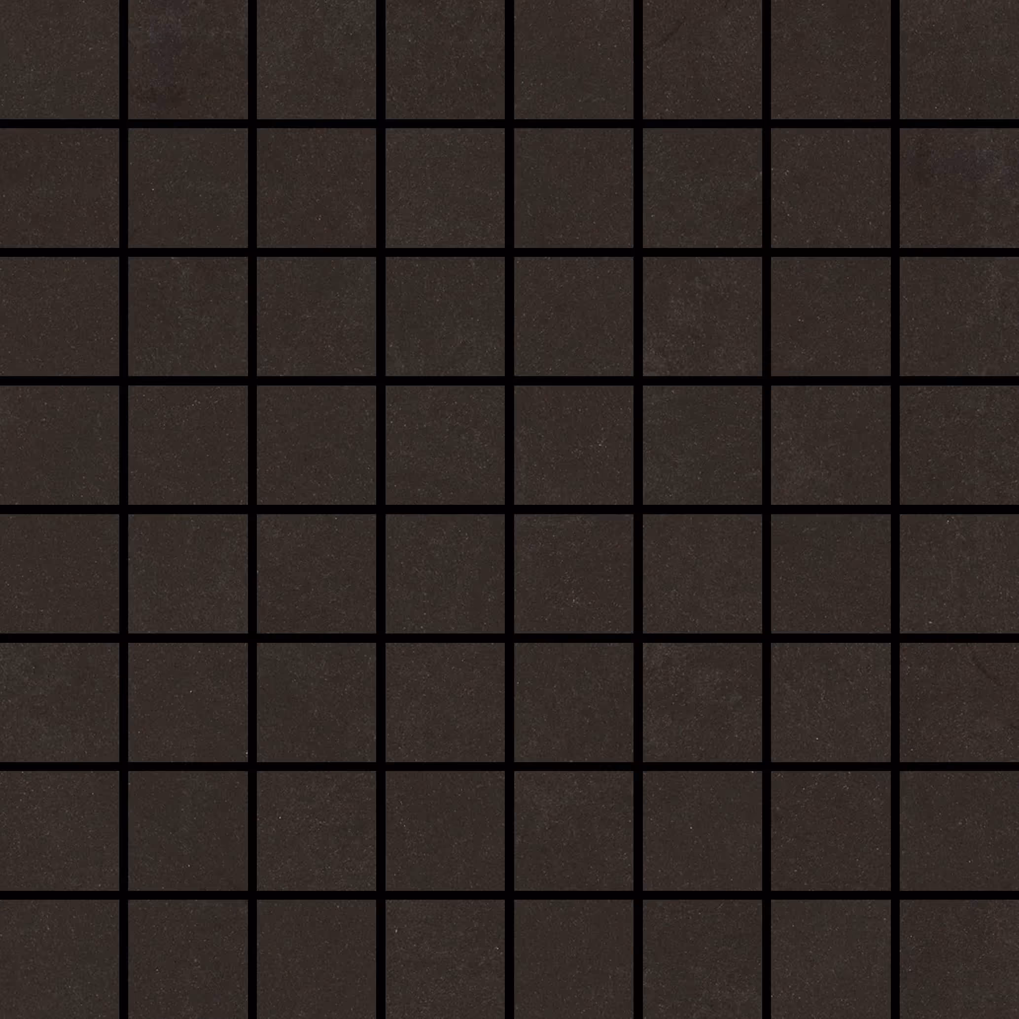 Close-up of black square mosaic tiles with grout lines.