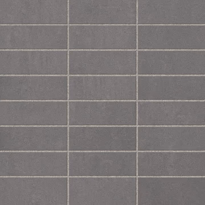 Grid of rectangular dark gray ceramic tiles with light gray grout lines.