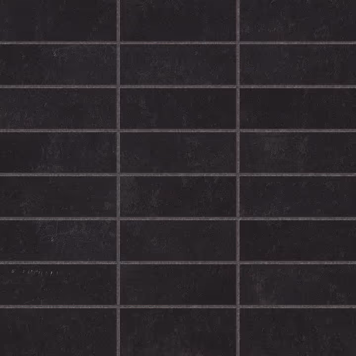 Grid of matte black rectangular tiles with subtle texture and gray grout lines.