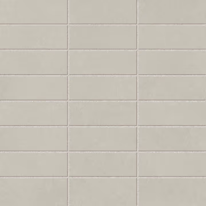 Close-up of light gray rectangular tiles arranged in a grid pattern with visible grout lines.