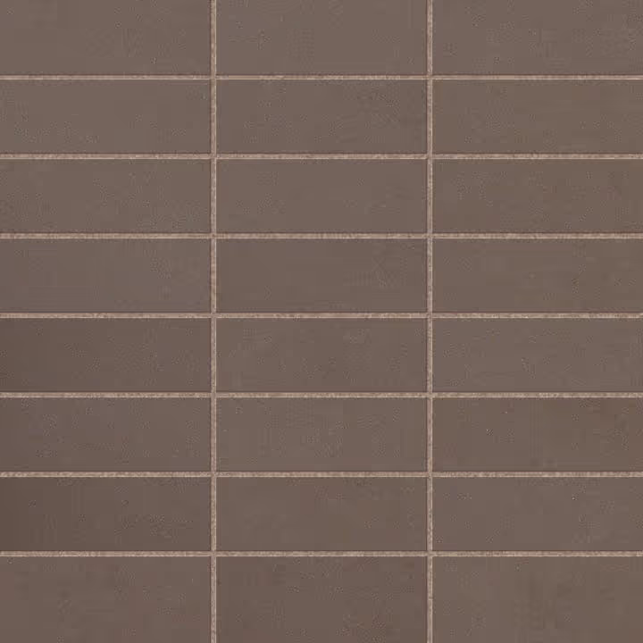 Close-up of rectangular brown ceramic wall tiles with visible grout lines.