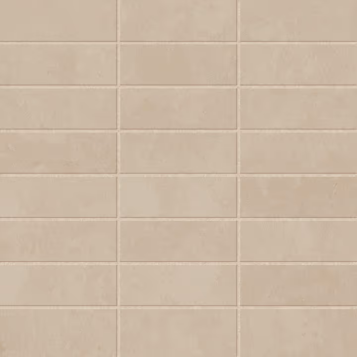 Beige ceramic rectangular tiles arranged in a grid pattern with grout lines.