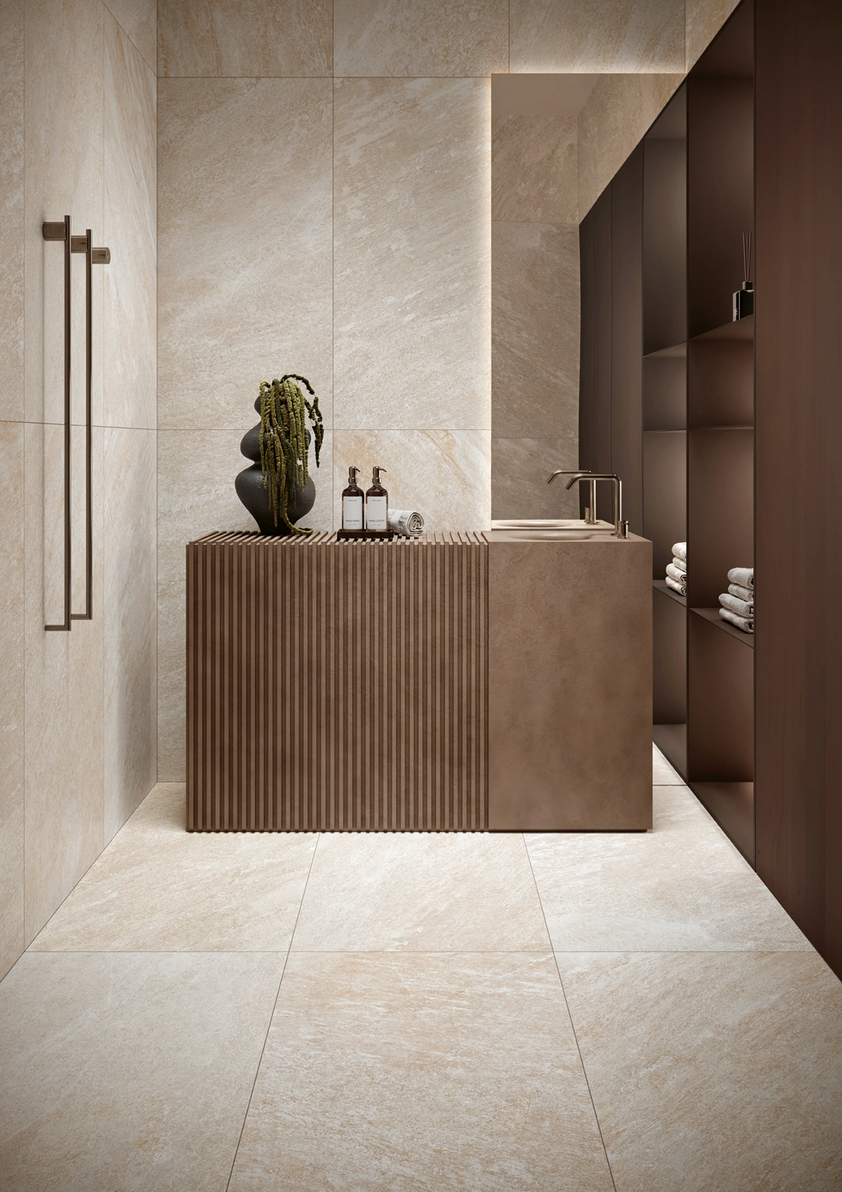 Modern bathroom with beige tiles, wooden vanity with sink, dark shelving, towels, and decorative vase.