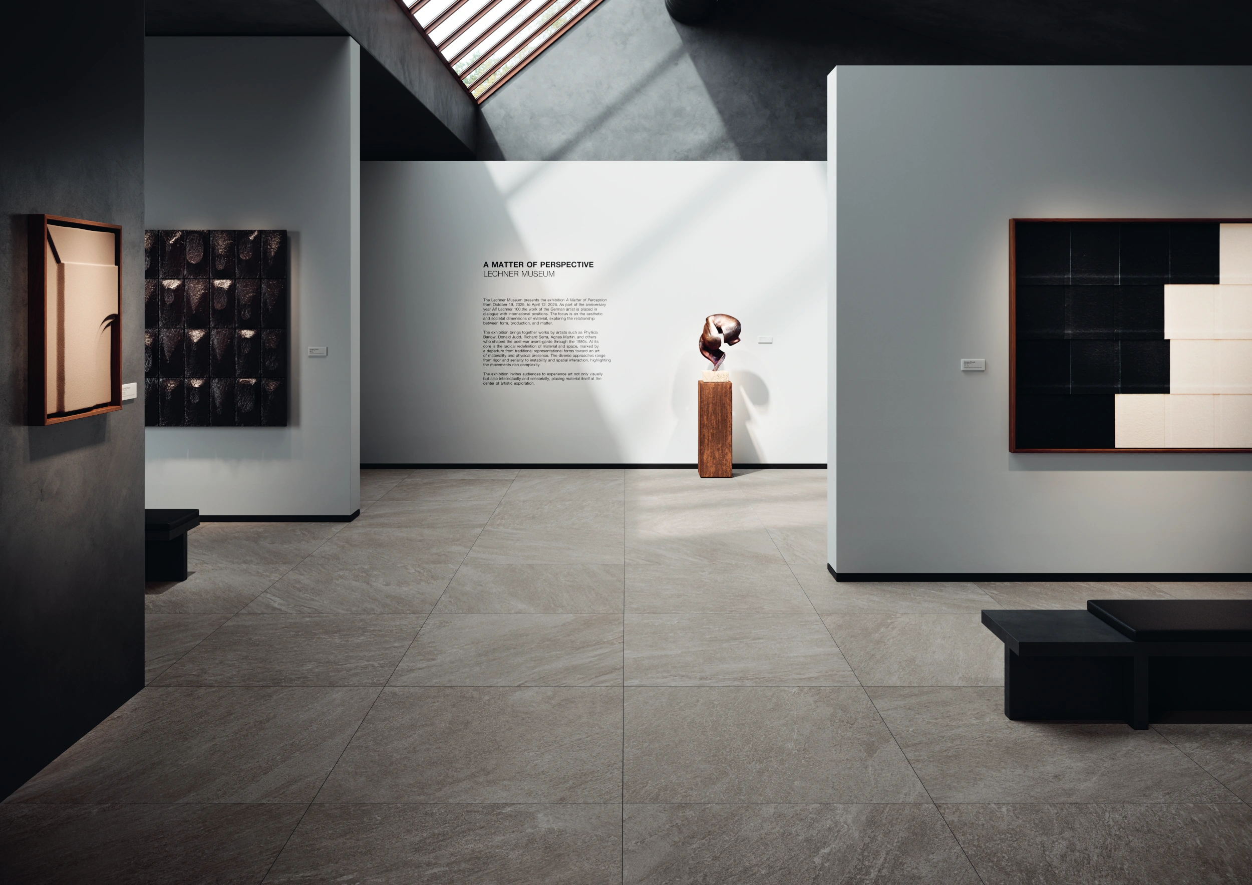 Modern art gallery with abstract paintings, a wooden sculpture on a pedestal, and skylight above.