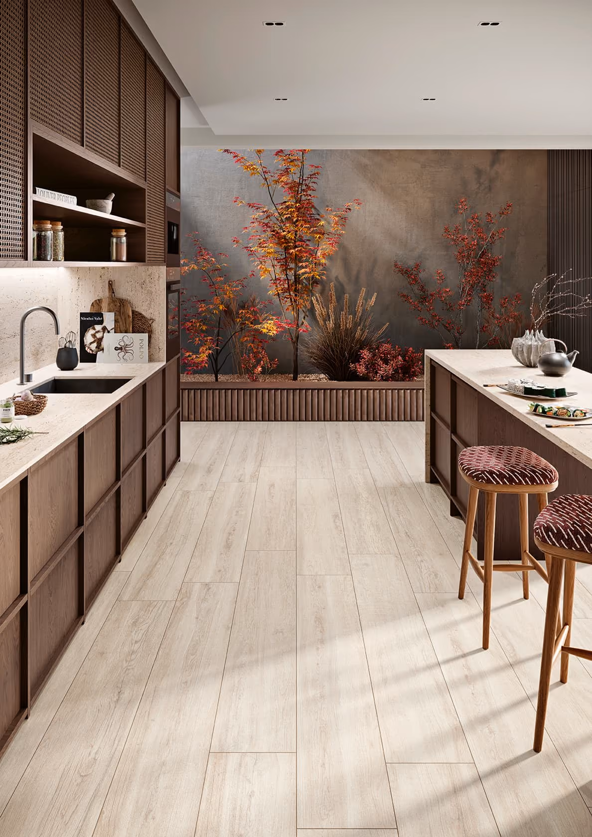 Modern kitchen with wooden cabinets, light flooring, island with stools, and decorative plants by a textured wall.