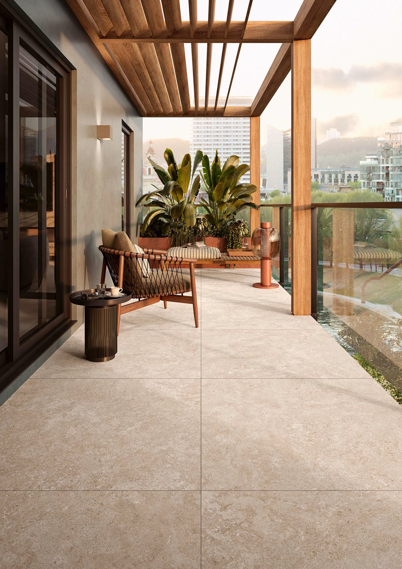Modern balcony with wooden pergola, glass railing, lounge chair, side table, and green plants.