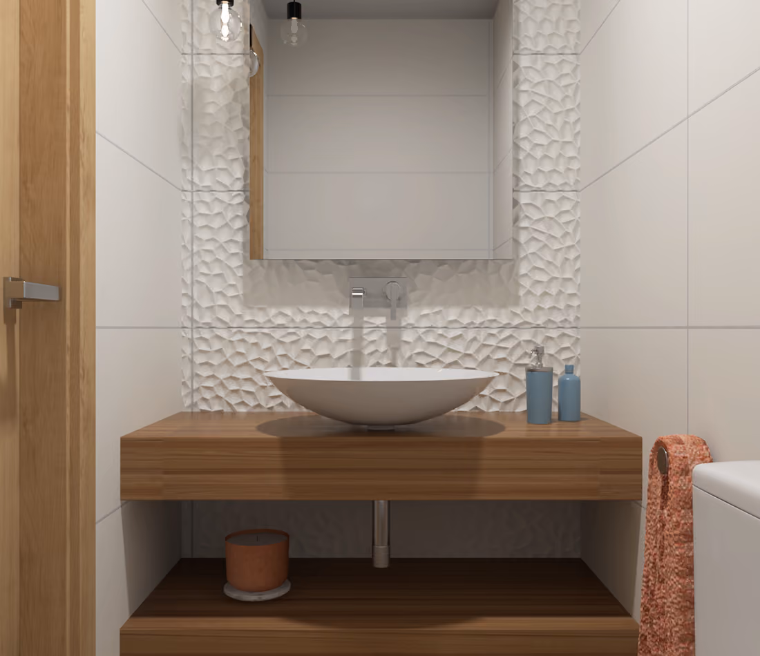 Modern bathroom with a wooden vanity holding a round basin sink, blue soap dispensers, and textured wall tiles.