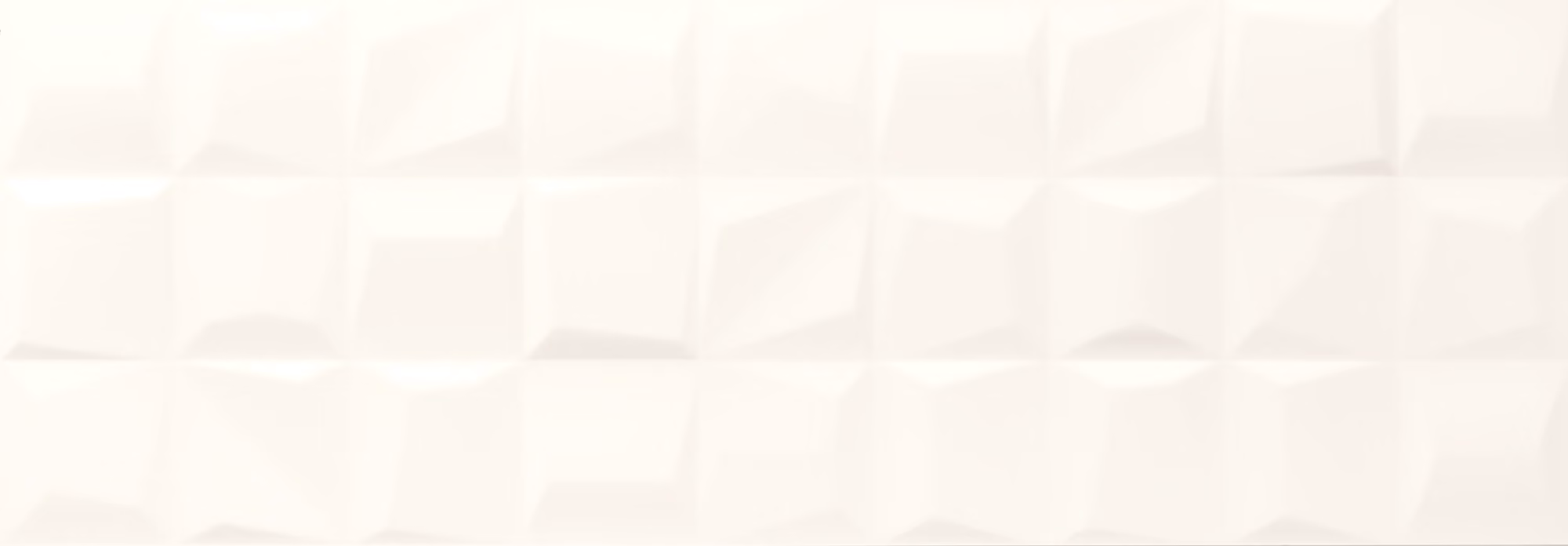 Pattern of white 3D cubes creating a geometric textured wall surface.