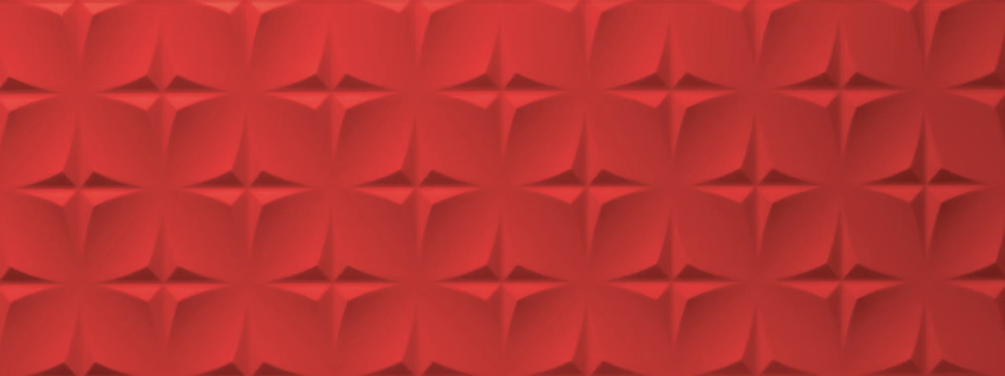 Red wall with a repeating geometric pattern of star shapes and rounded diamond forms.