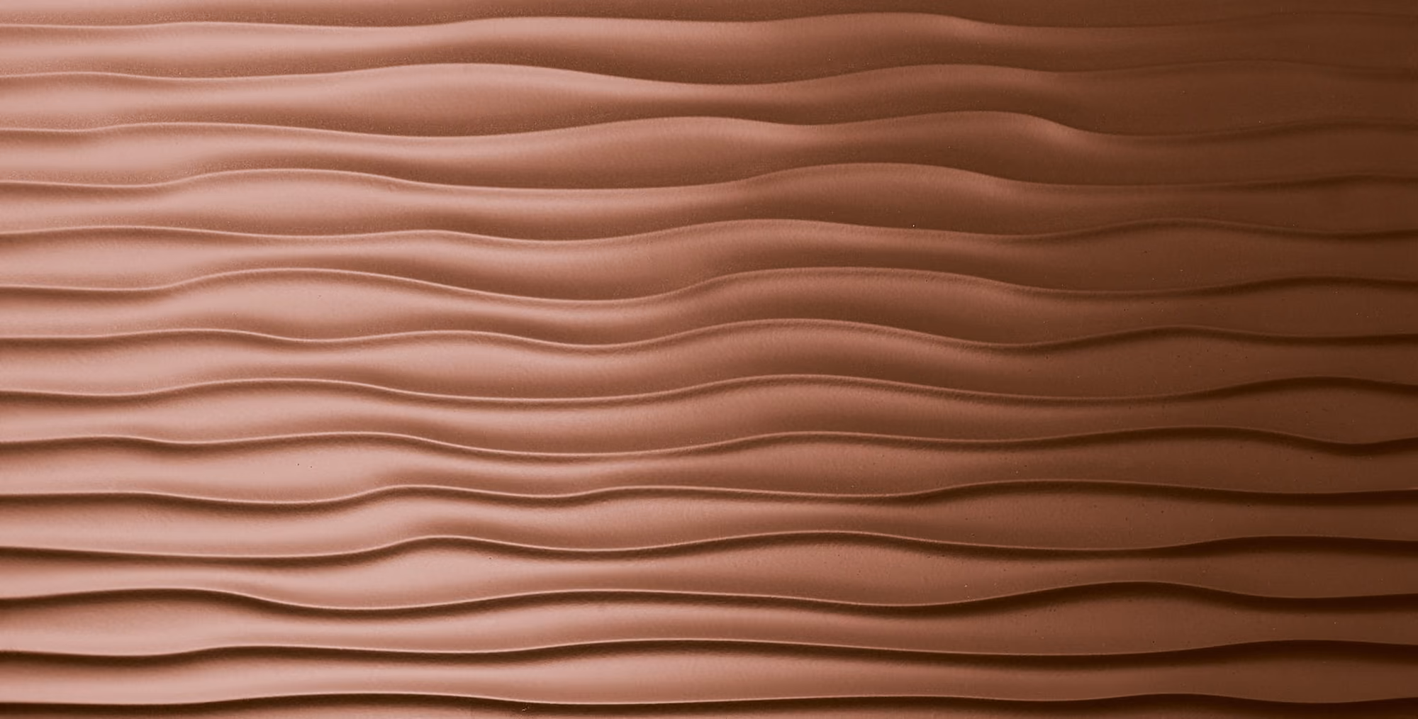 Close-up of horizontal wavy copper-colored ridges with a textured surface.