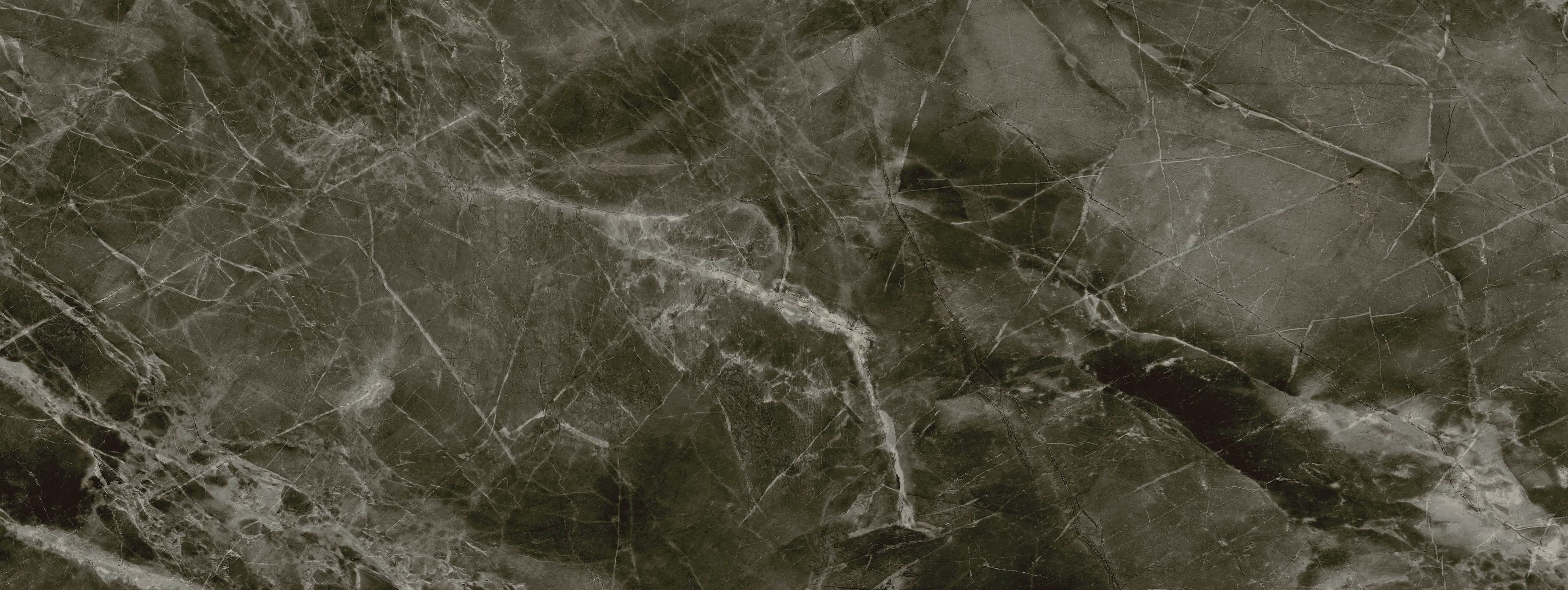 Dark green marble surface with white and light gray veining patterns.