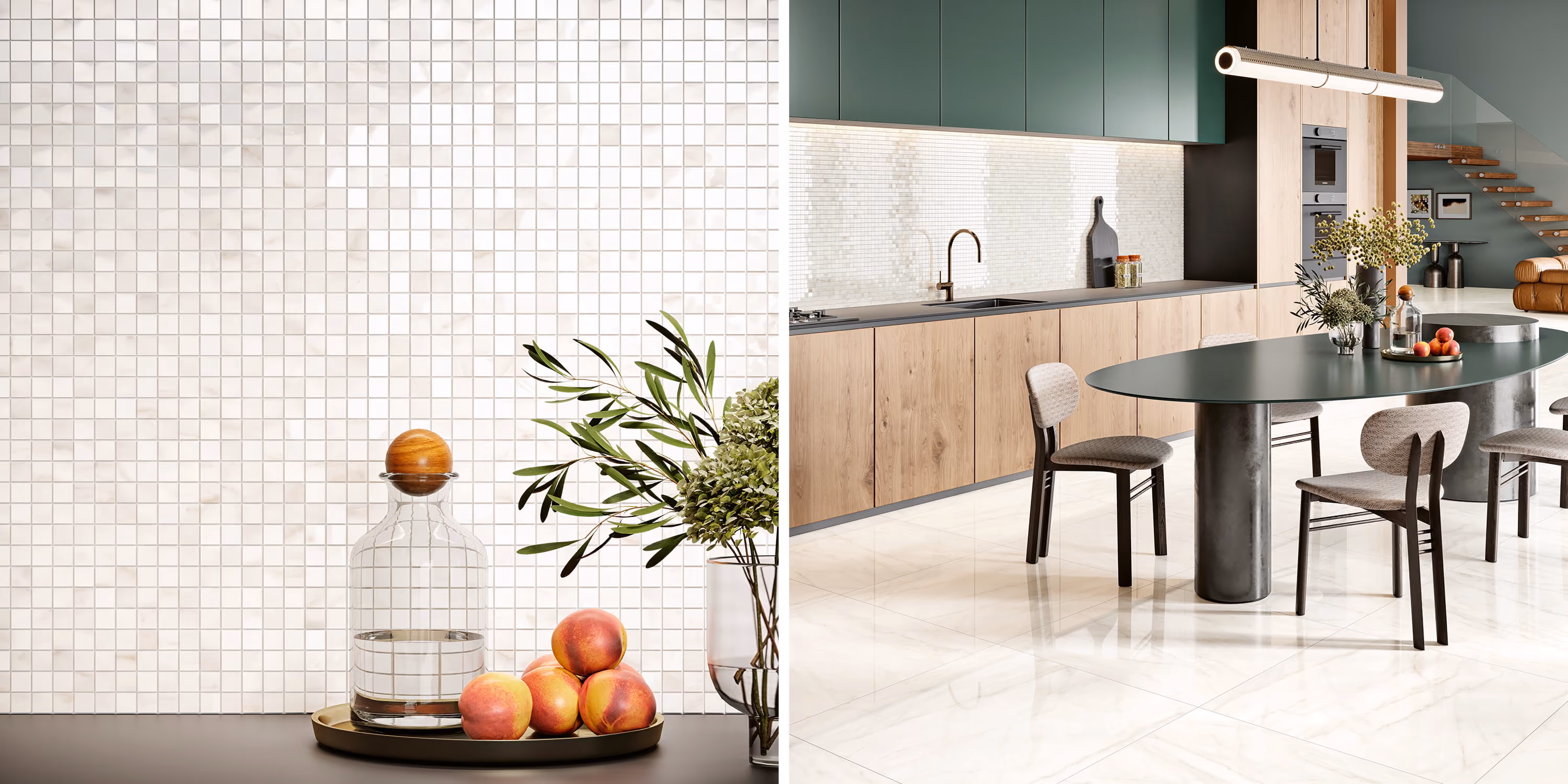 Modern kitchen with green cabinets, wood lower cabinets, black oval table, and decorative plants and fruit.
