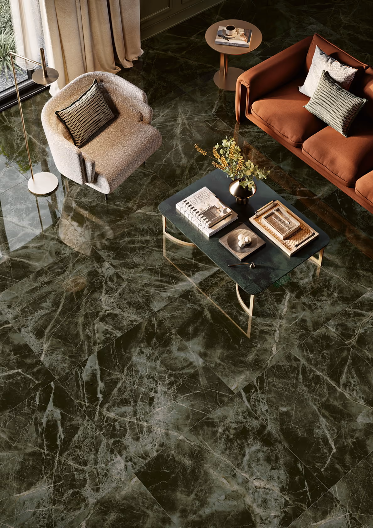 Living room with green marble floor, beige armchair, brown sofa, and a coffee table with books and flowers.