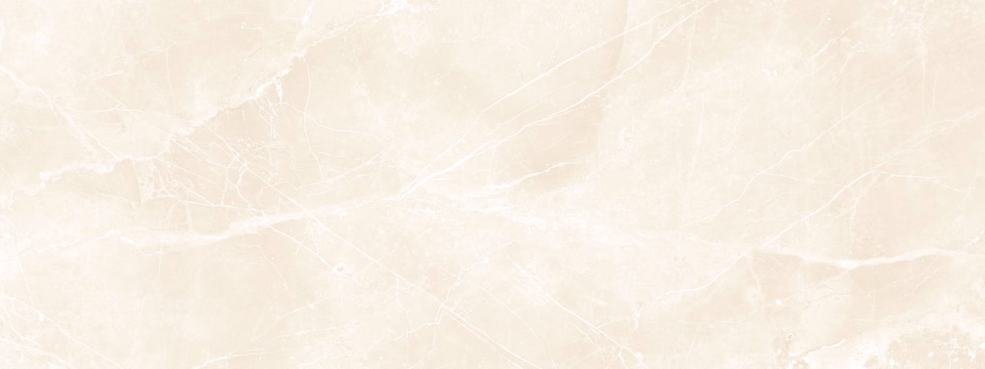Cream-colored marble texture with subtle white veining across the surface.