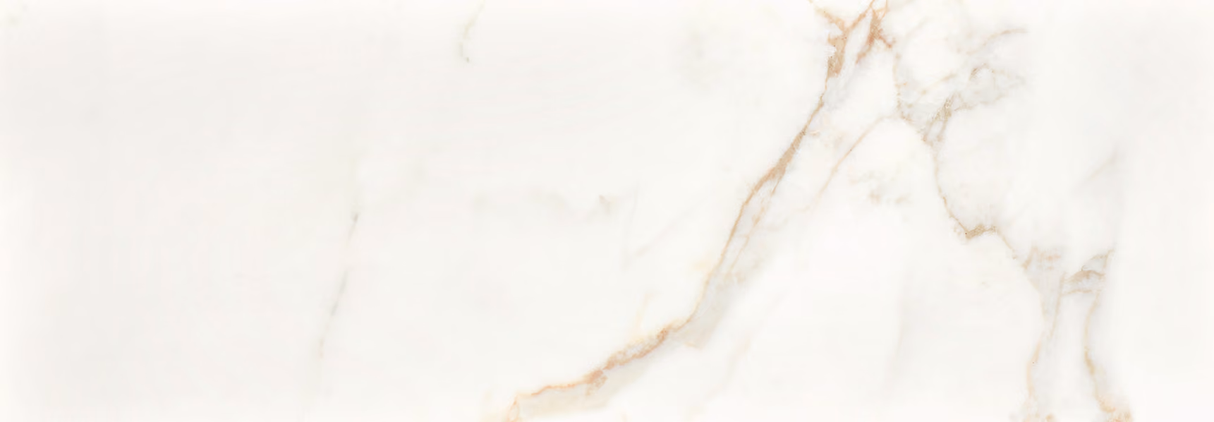 White marble surface with light brown and gray veining patterns.