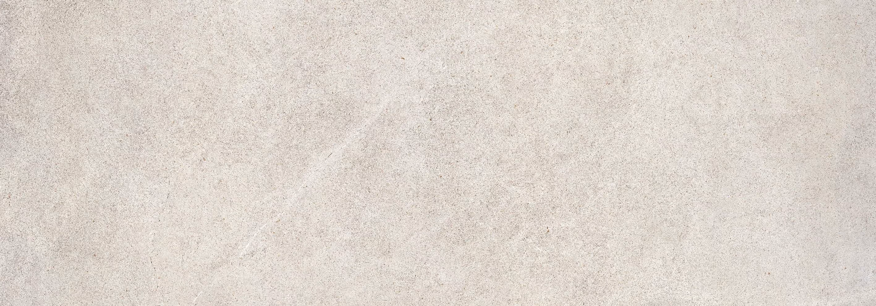 Light grey textured concrete surface with subtle variations and speckles.
