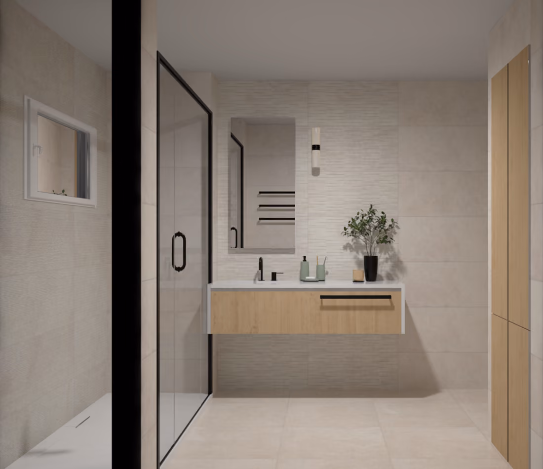 Modern bathroom with floating vanity, glass shower enclosure, wall mirror, and decorative plant.