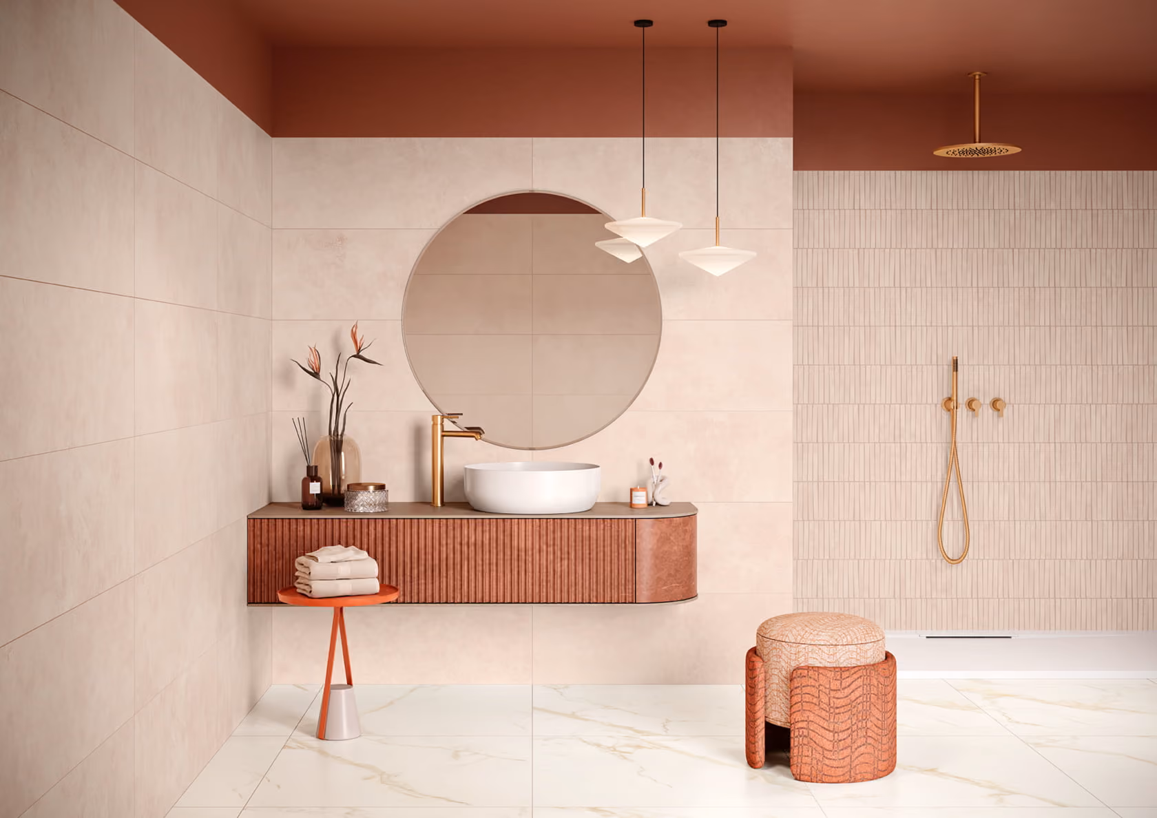 Modern bathroom with round mirror, white sink, gold faucet, pendant lights, and textured brown stool.