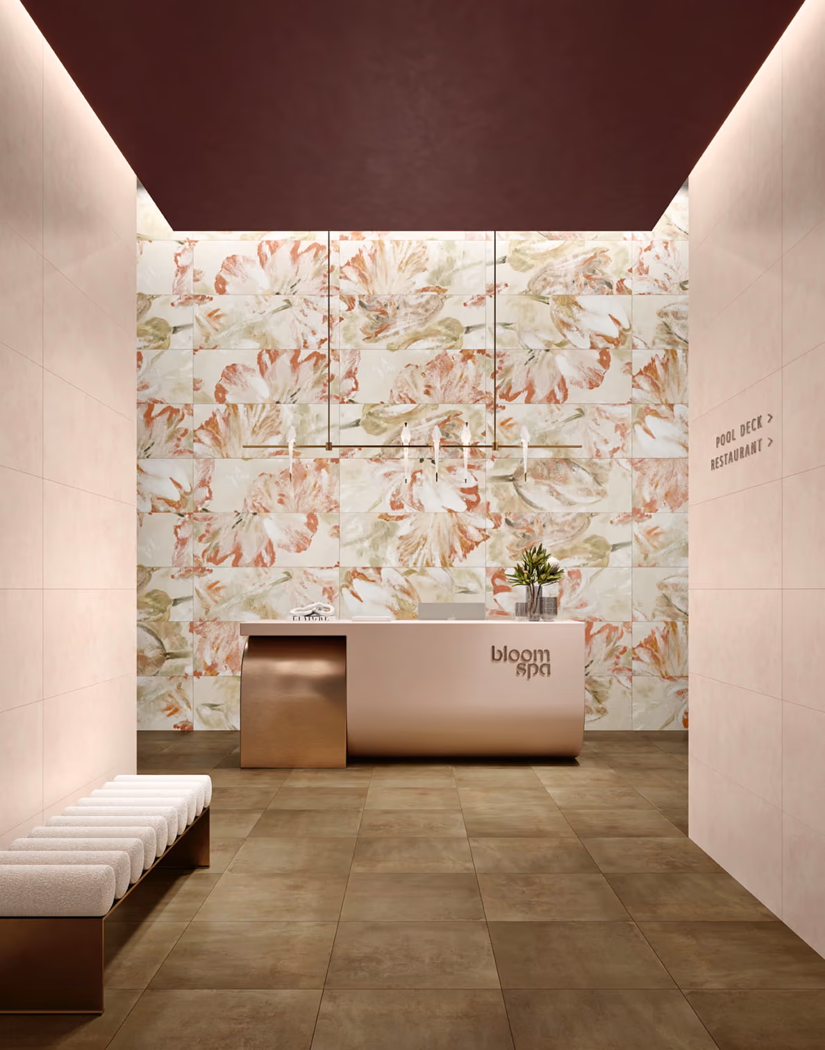 Modern spa reception with floral wall, sleek desk, bench, and directional signs to pool deck and restaurant.
