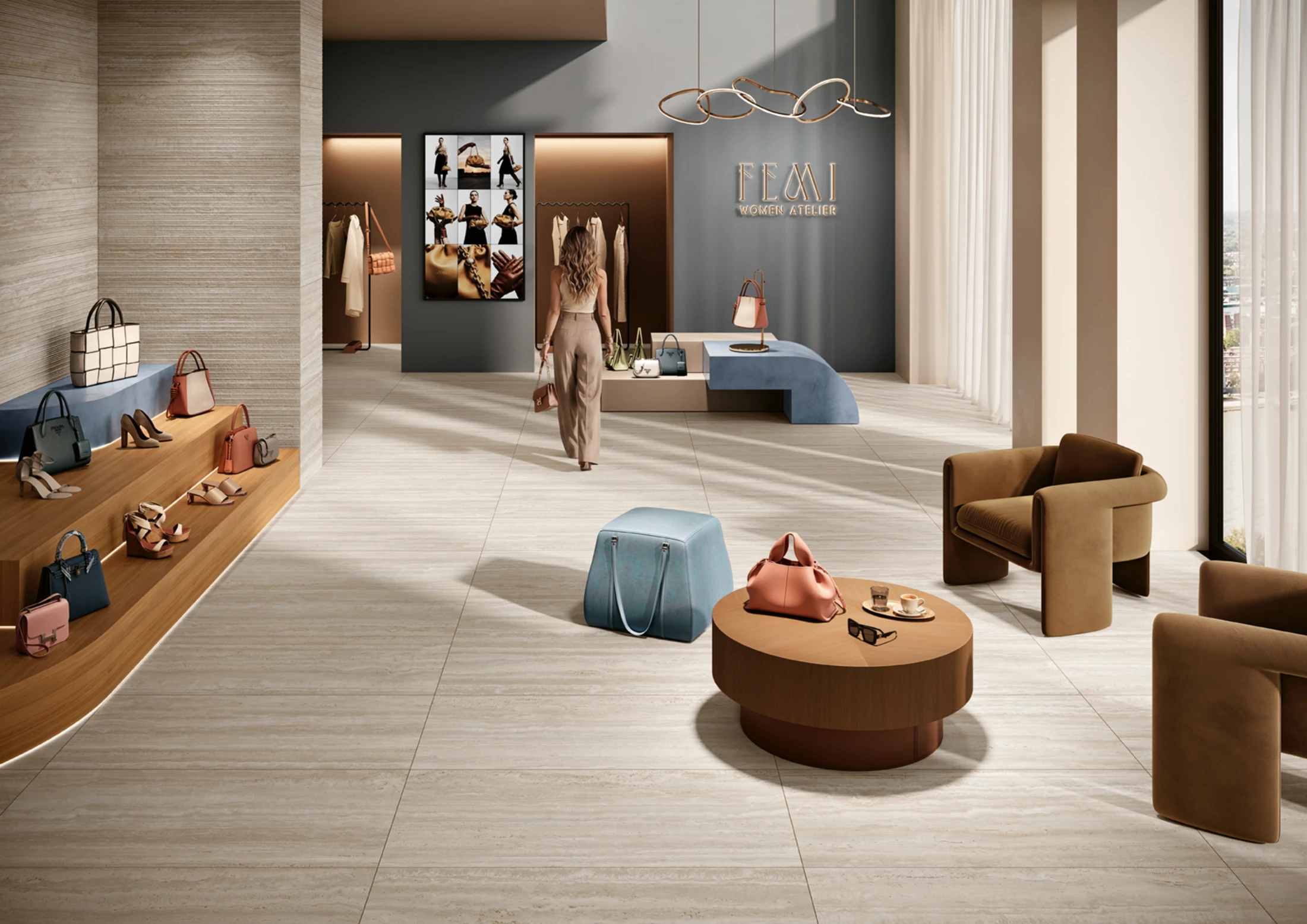 Modern boutique interior with handbags, shoes, lounge chairs, and a woman walking toward displays.