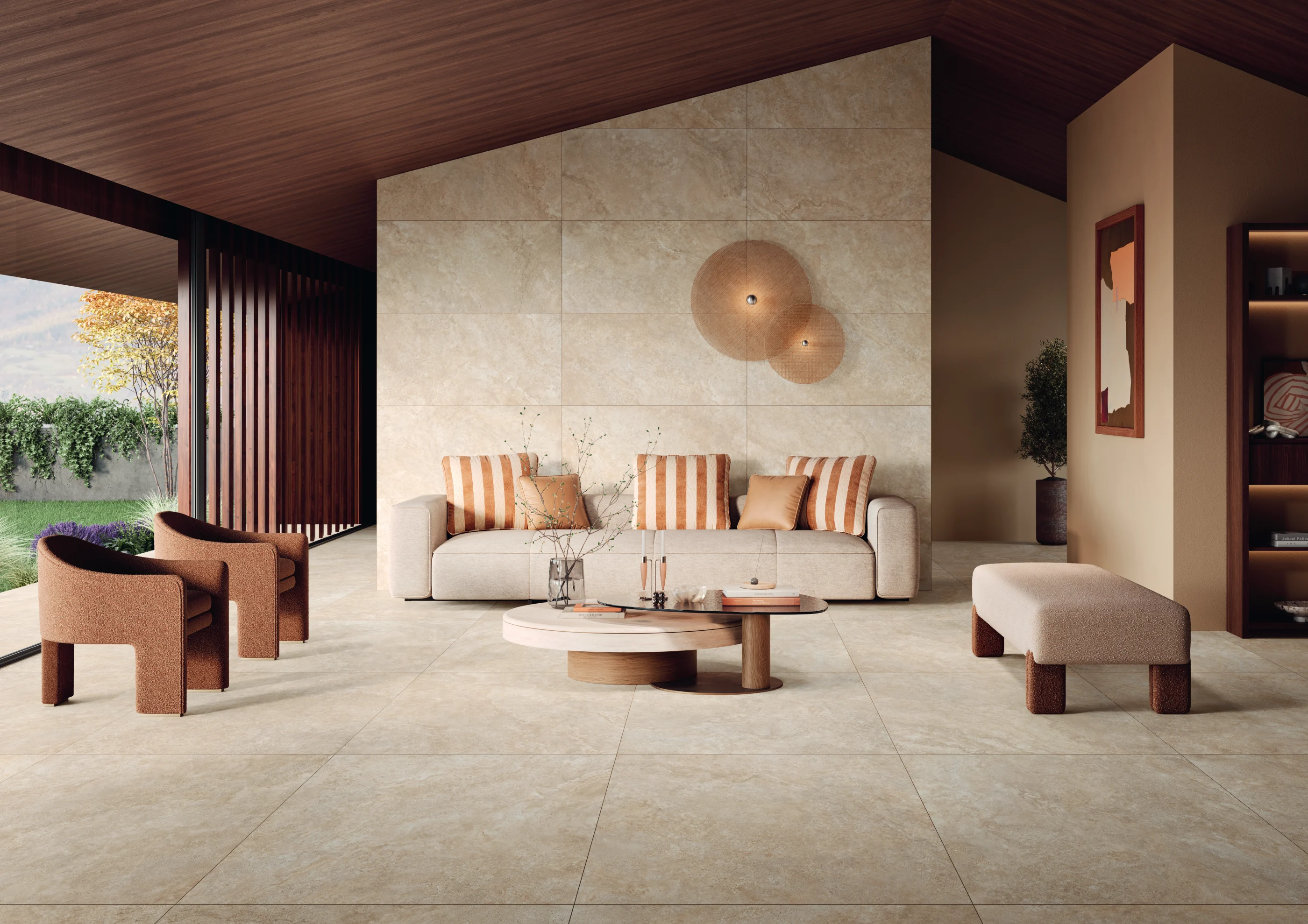 Modern living room with beige sofa, striped pillows, two armchairs, bench, round coffee tables, and wood ceiling.
