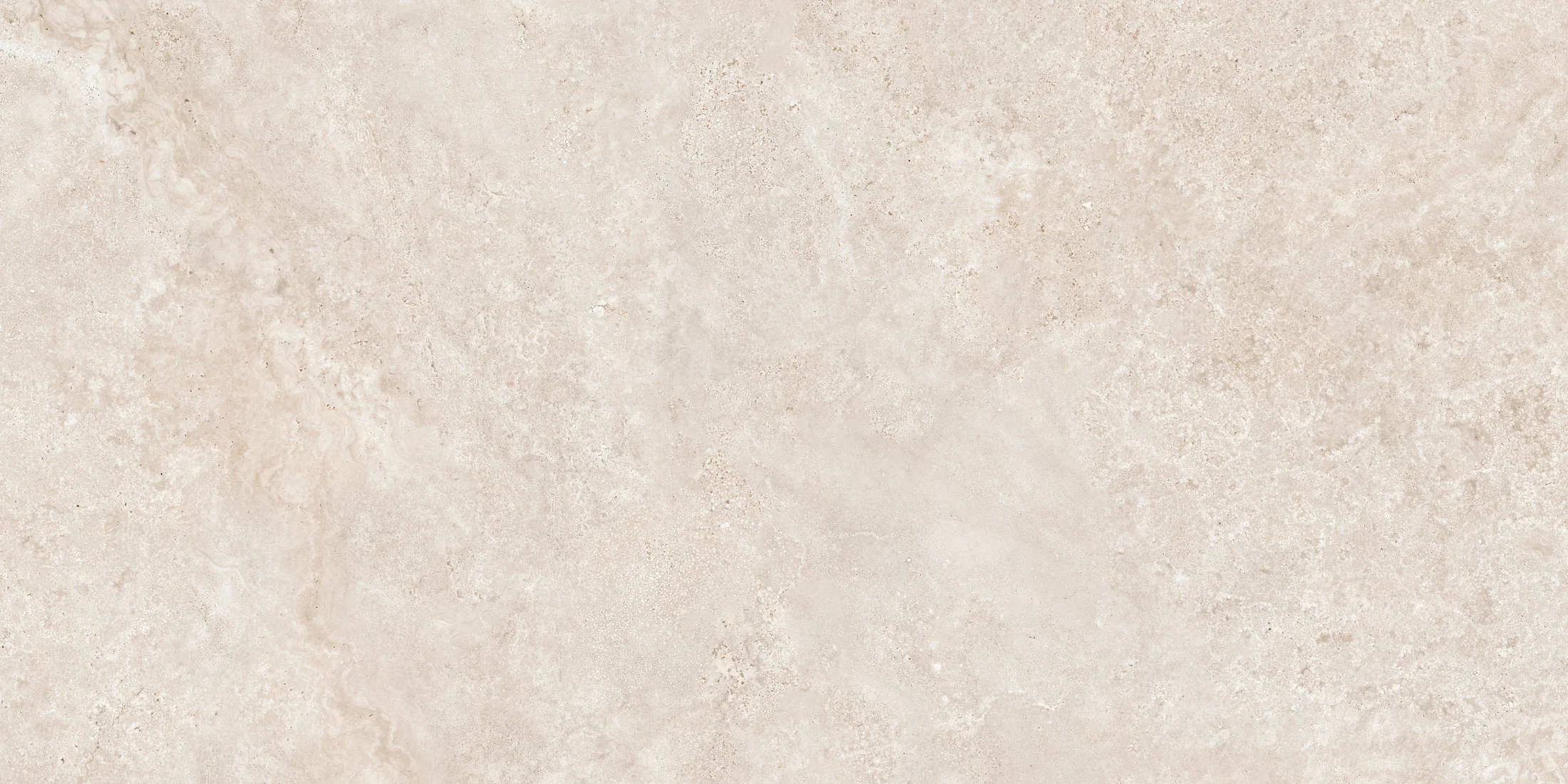 Close-up of beige textured stone surface with natural patterns and grain.