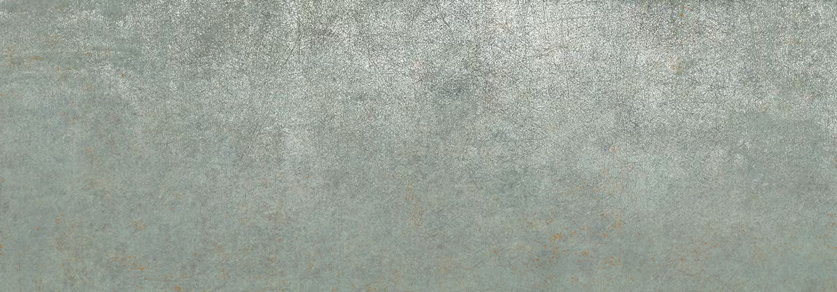 Textured greenish-gray surface resembling oxidized metal with subtle patches of rust.