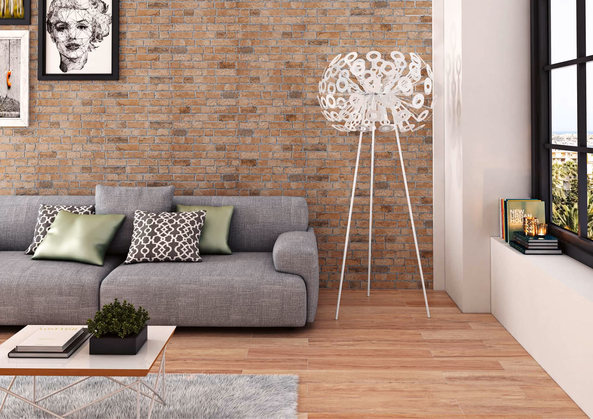Modern living room with gray sofa, patterned pillows, brick wall, unique floor lamp, and books by the window.
