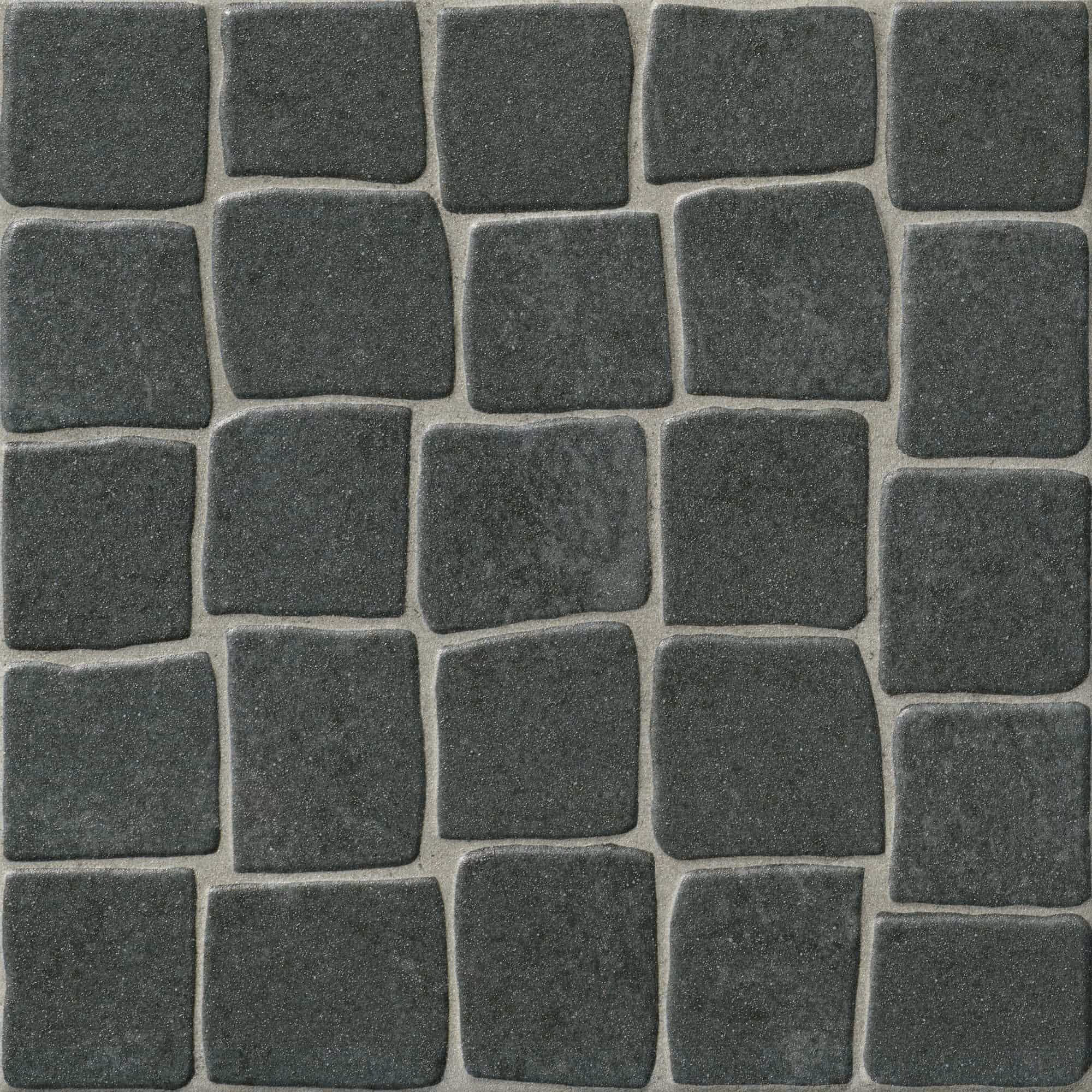 Square pattern of rough dark gray cobblestones with concrete mortar in between.