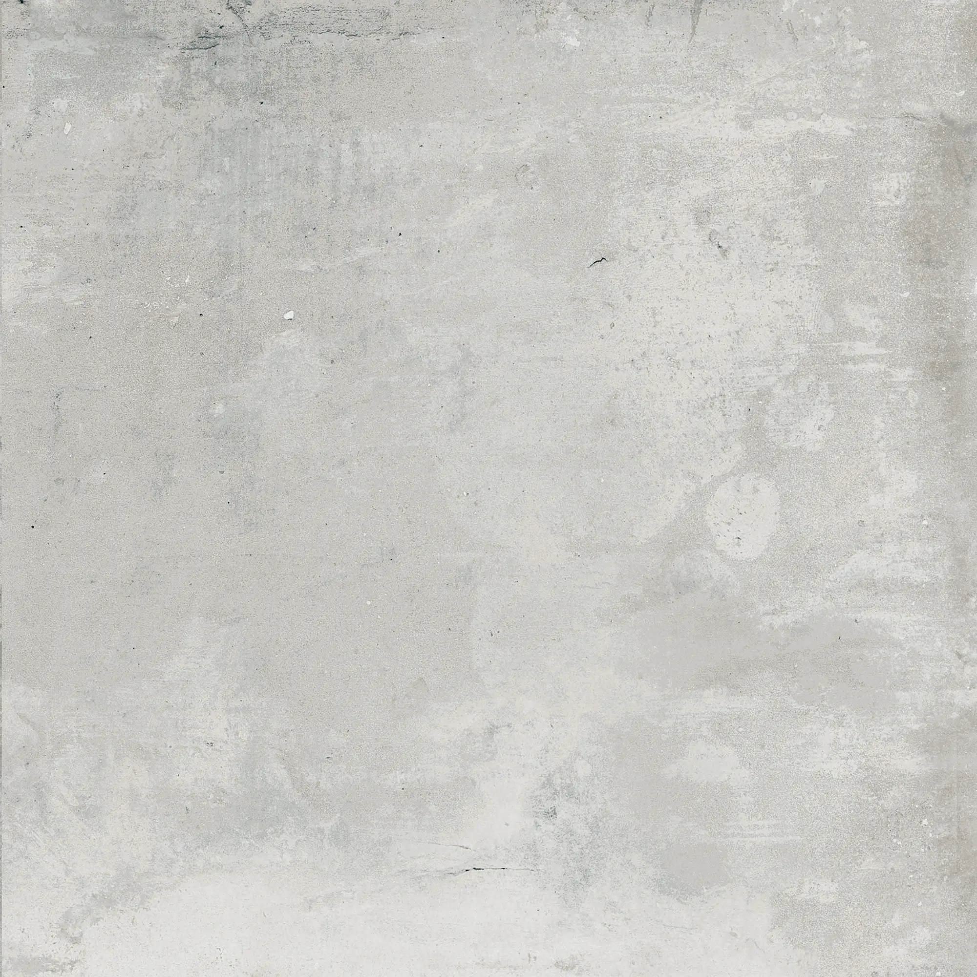 Light grey textured concrete surface with subtle variations and small specks.