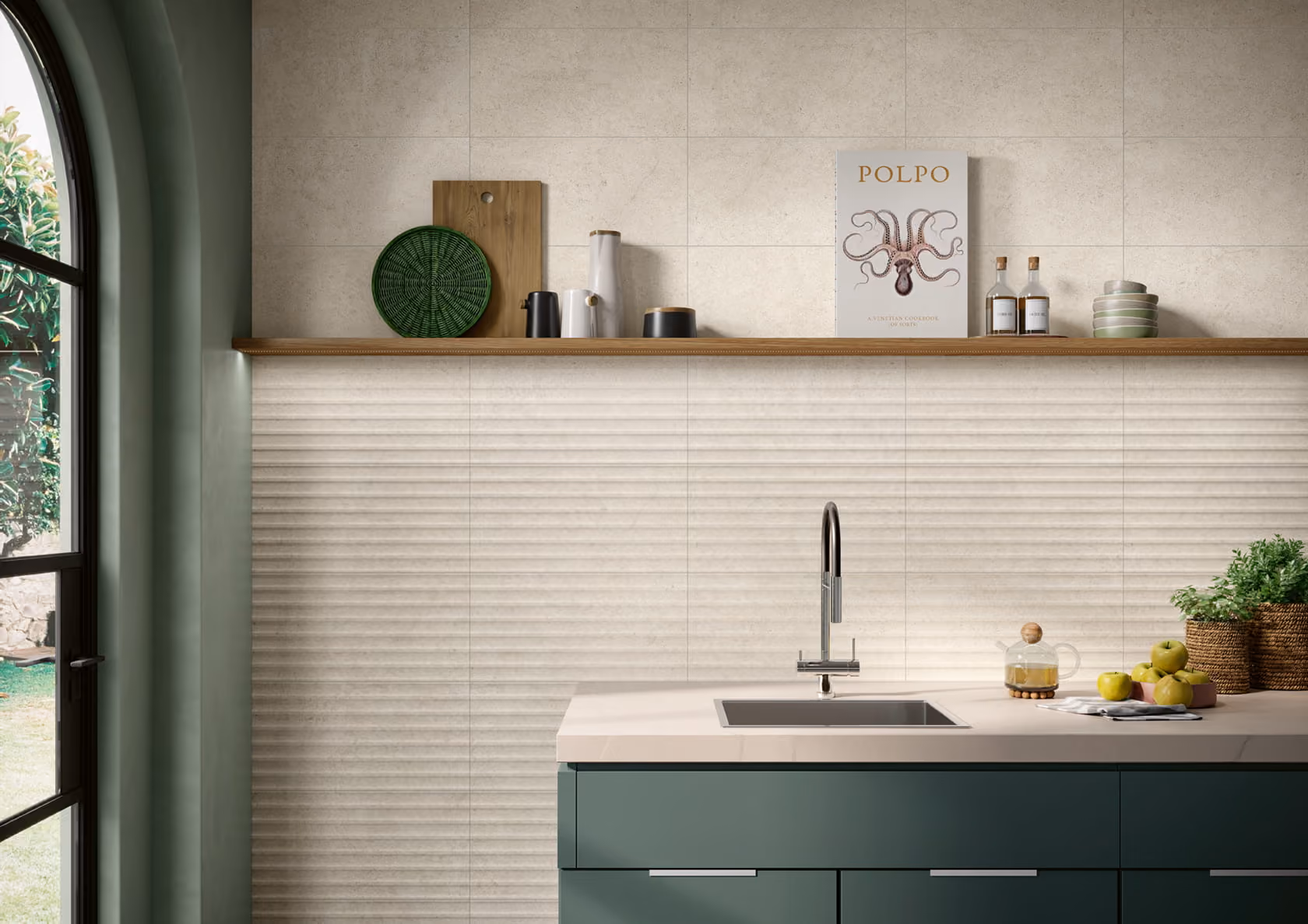 Modern kitchen sink with green cabinets, wooden shelf holding dishes and octopus art print.