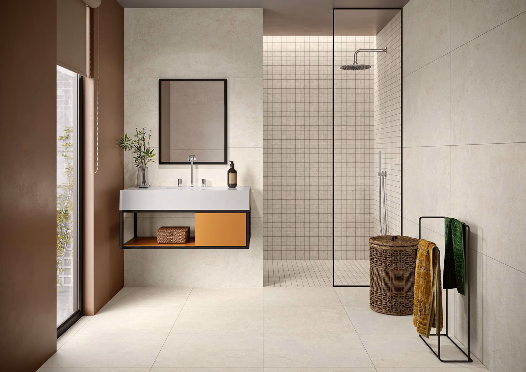 Modern bathroom with a floating sink, mirror, glass shower, wicker laundry basket, and towel rack.