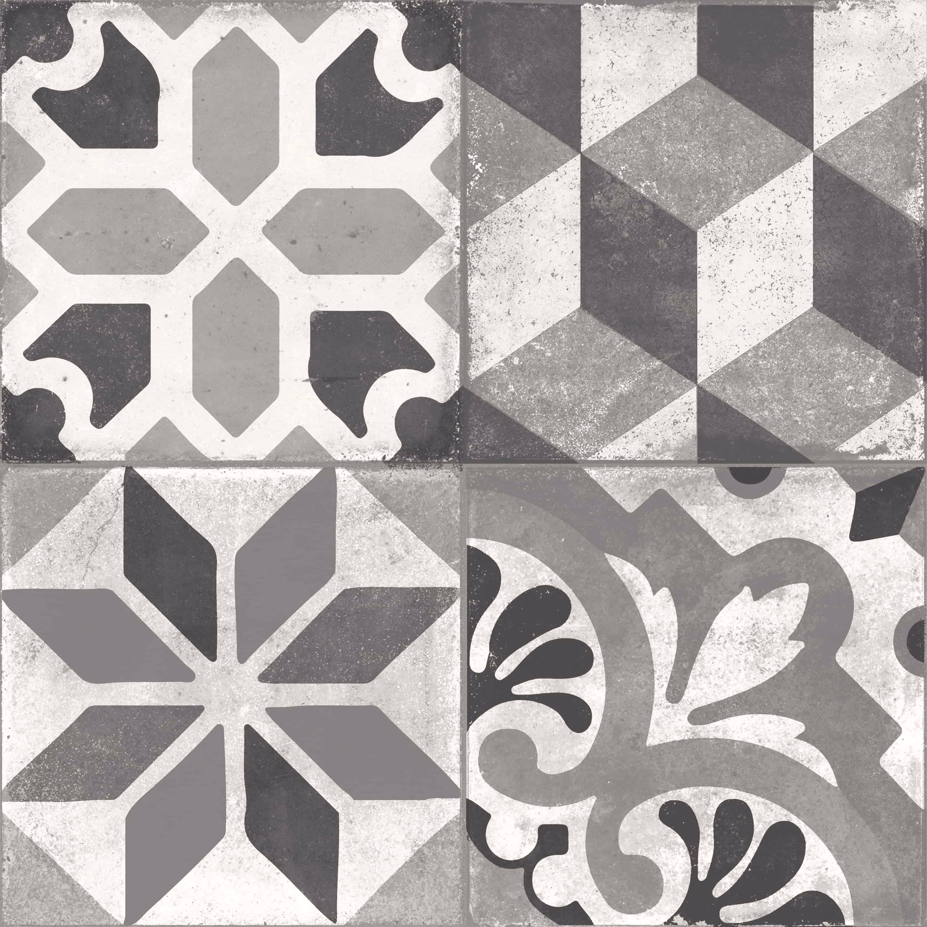 Four gray and white vintage geometric and floral patterned tiles forming a square.