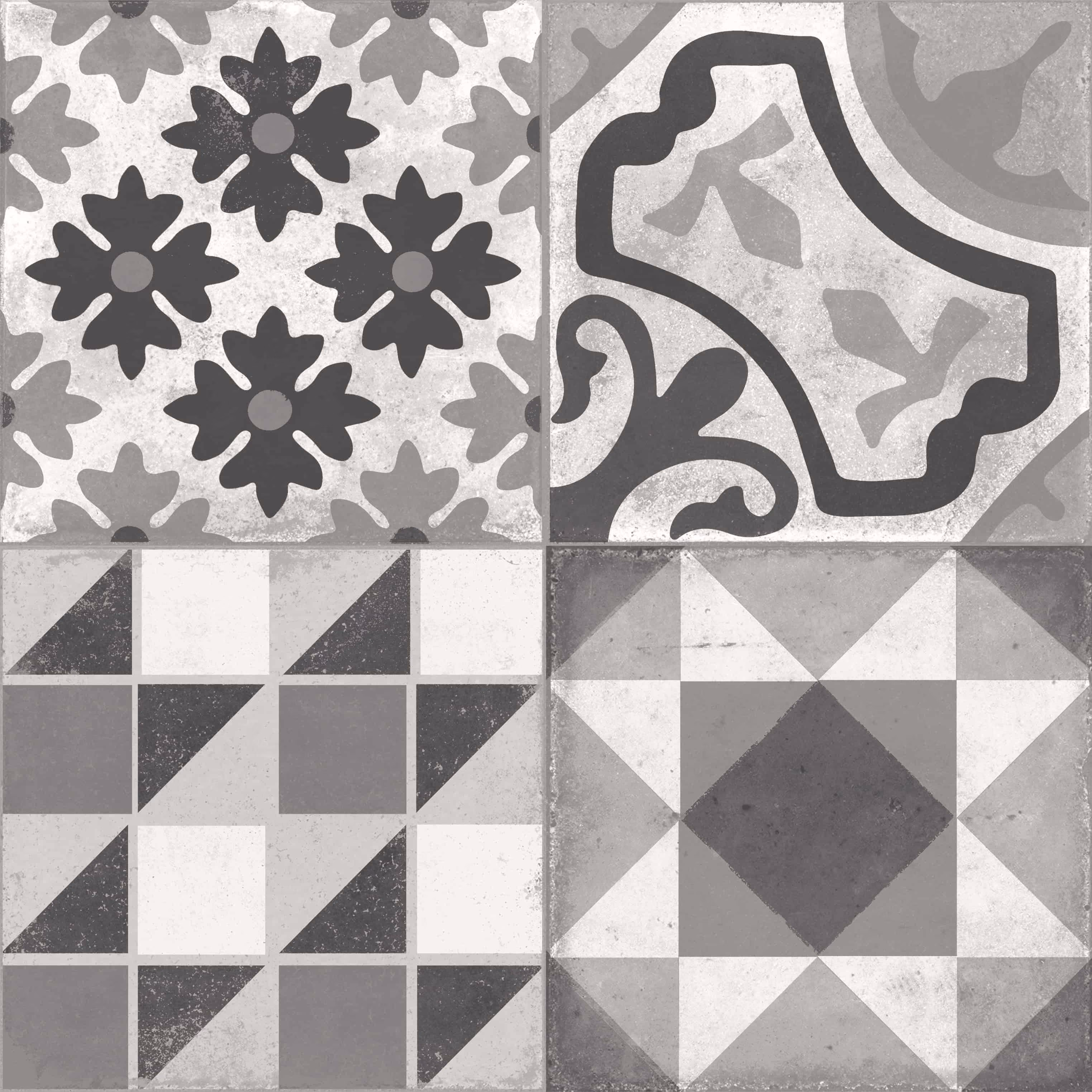 Four gray and black patterned ceramic tiles with floral and geometric designs.