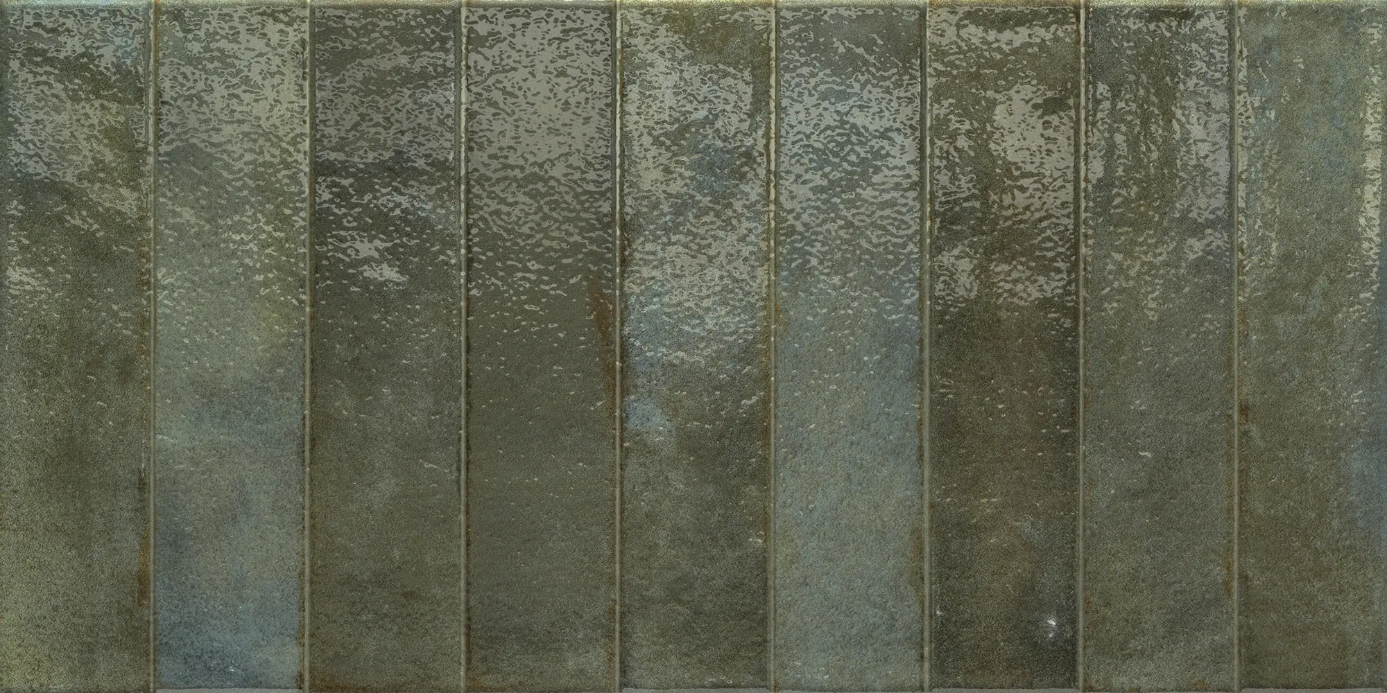 Glossy rectangular ceramic tiles in muted green and blue shades arranged in rows.