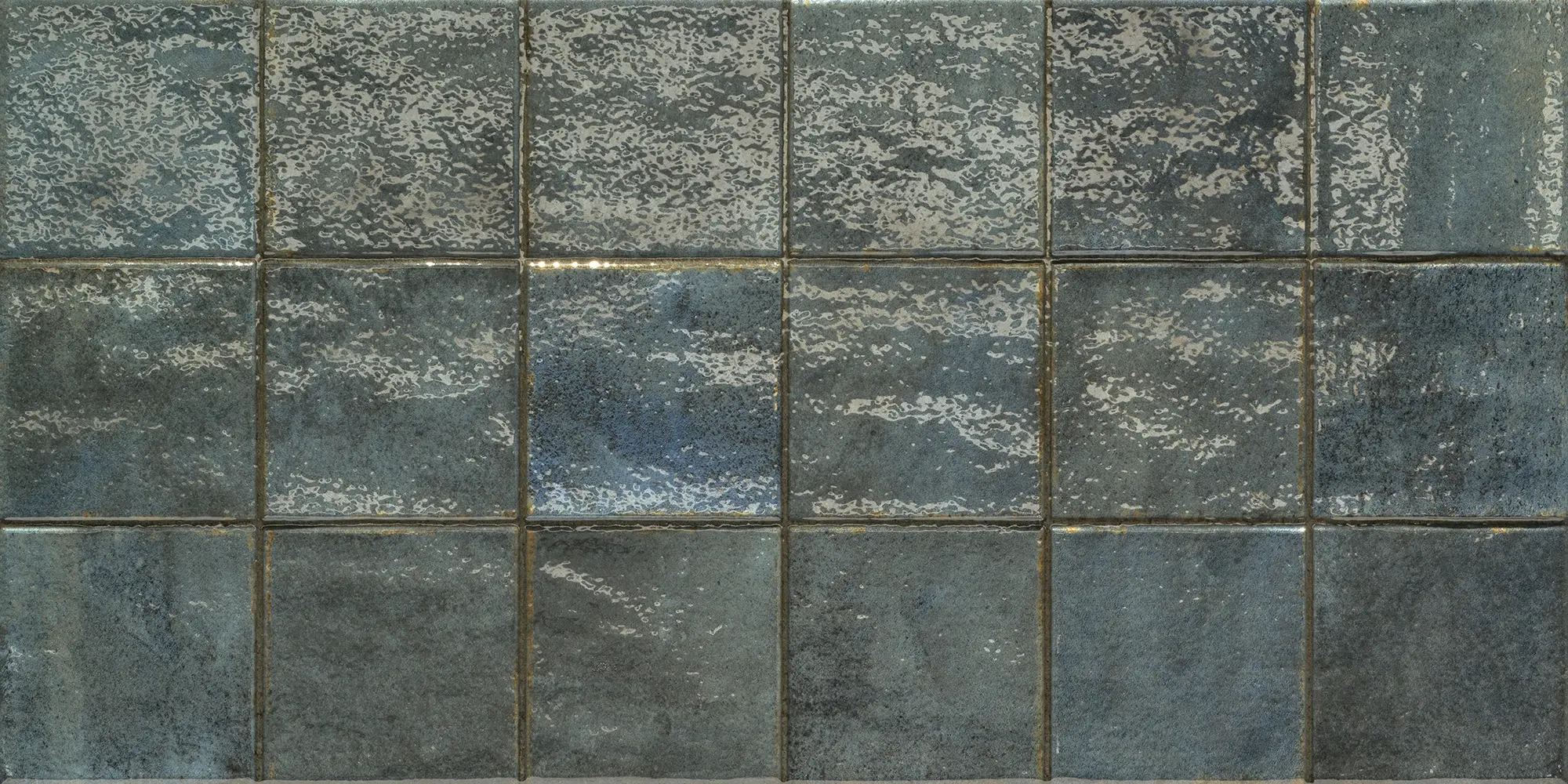 Pattern of blue square ceramic tiles with a textured, mottled surface and grout lines.